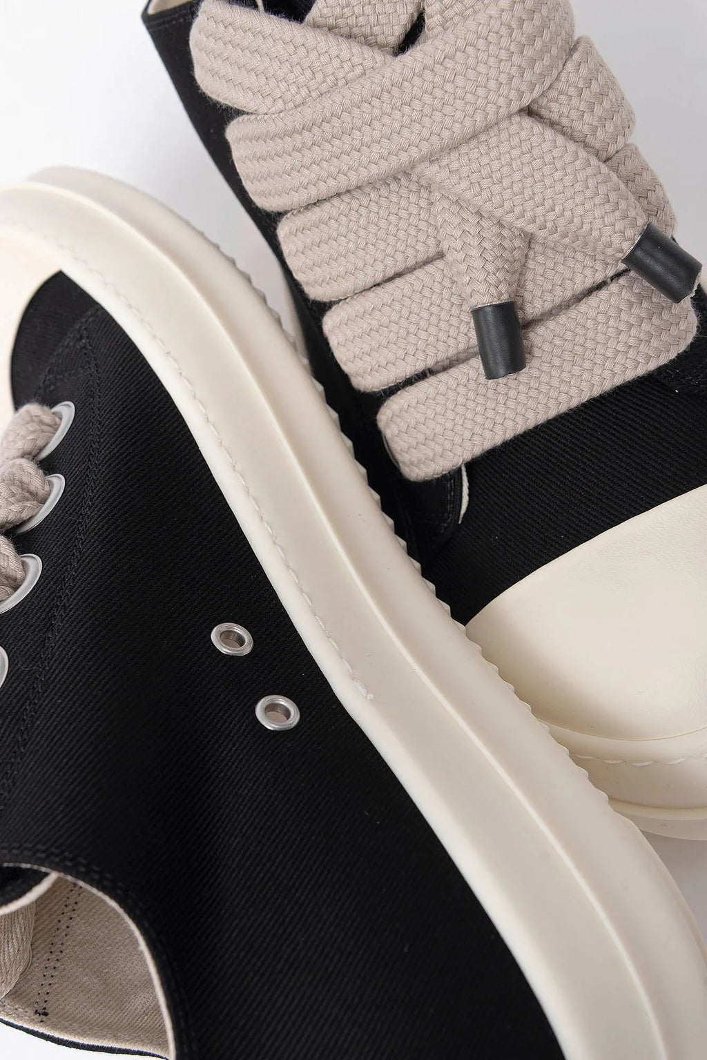Rick Owens DRKSHDW, Mens Sneakers, Black Milk, Denim Sneakers with Rubber Soles, Jumbo Laces, Big Laces, Lace-up low top, White Rubber, DRKSHDW Lettering on insoles, Silver-Tone Details, Top-Down Side Angle View. 