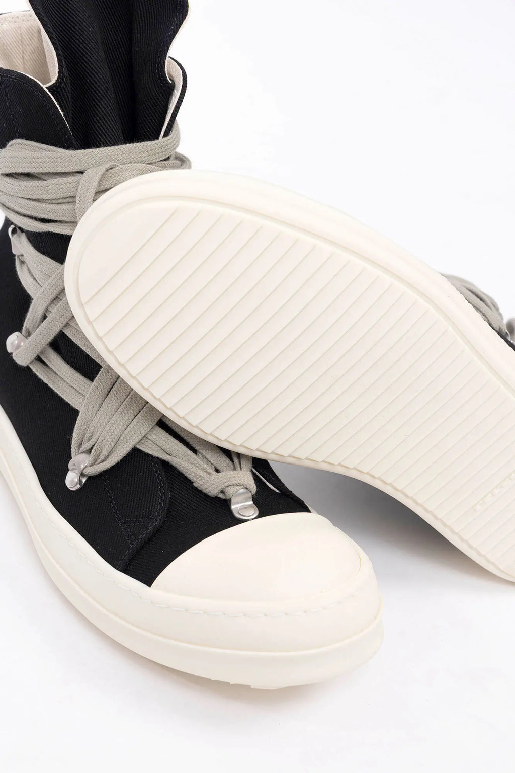 Rick Owens, Mens Shoes, Black Milk, White, Off-White, High Top Sneakers, Side Zipper Shoes, Side Zipper Sneakers, Megalace, Long Laces, Black Denim, Rubber Outsole, Close-up Underside View. 