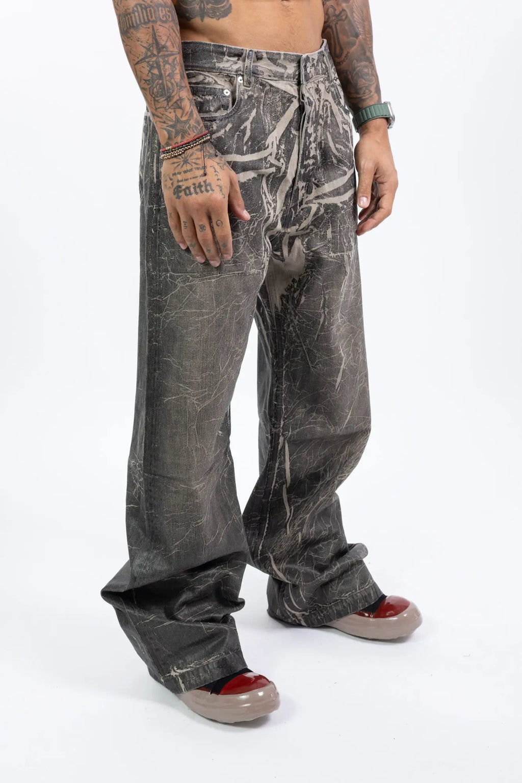 Rick Owens,Mens Jeans,Wide Fit,Mid-Rise,Full Length,Concealed Zipper Fly With Top Button,Waistband With Belt Loops,Pocket Rivets,Rear Patch Pockets And Topstitching,Medium-Weight Washed Foil Denim , 13OZ JP Black And Natural Denim,Side View.