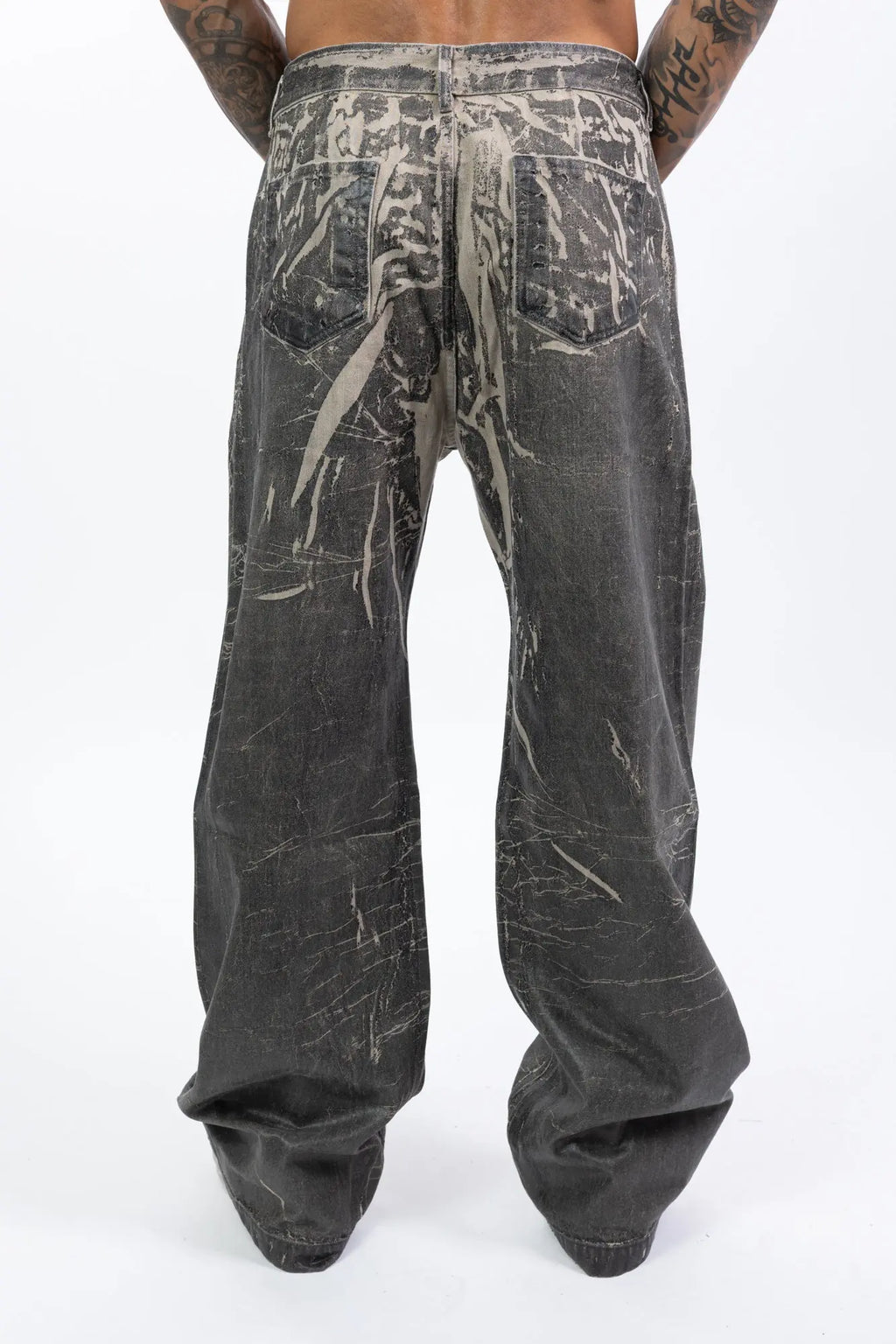 Rick Owens,Mens Jeans,Wide Fit,Mid-Rise,Full Length,Concealed Zipper Fly With Top Button,Waistband With Belt Loops,Pocket Rivets,Rear Patch Pockets And Topstitching,Medium-Weight Washed Foil Denim , 13OZ JP Black And Natural Denim,Back View.