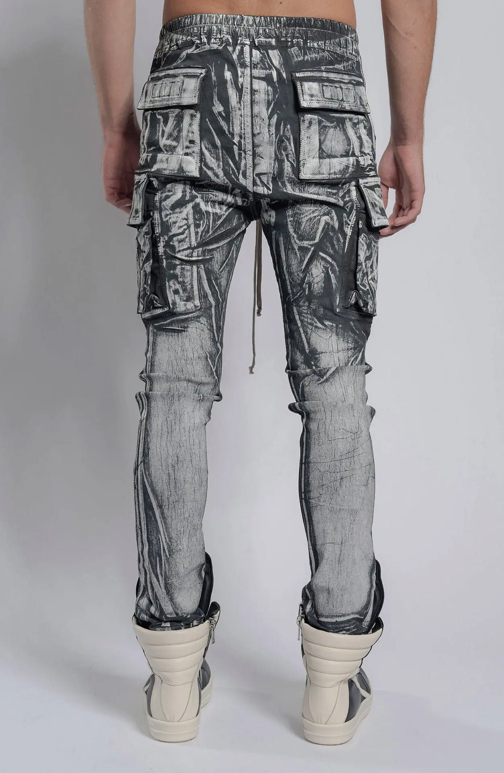 Rick Owens,Mens Denim Pants,Elastic Waistband,Drawstrings,Elastic Cuffs,Two Zippered Cargo Pockets On The Outer Thigh With Flaps,Two Back Patch Pockets With Flaps,Back View.