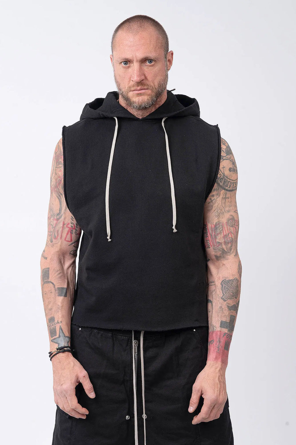 Rick Owens, Mens Temple Tunic,Hip Length,Sleeveless,Black Furka Heavy Sweatshirt Jersey,Large Hood With Drawstrings,Wide Square Body,Garment Dyed,GOTS Certified Organic Cotton,Front Portrait.