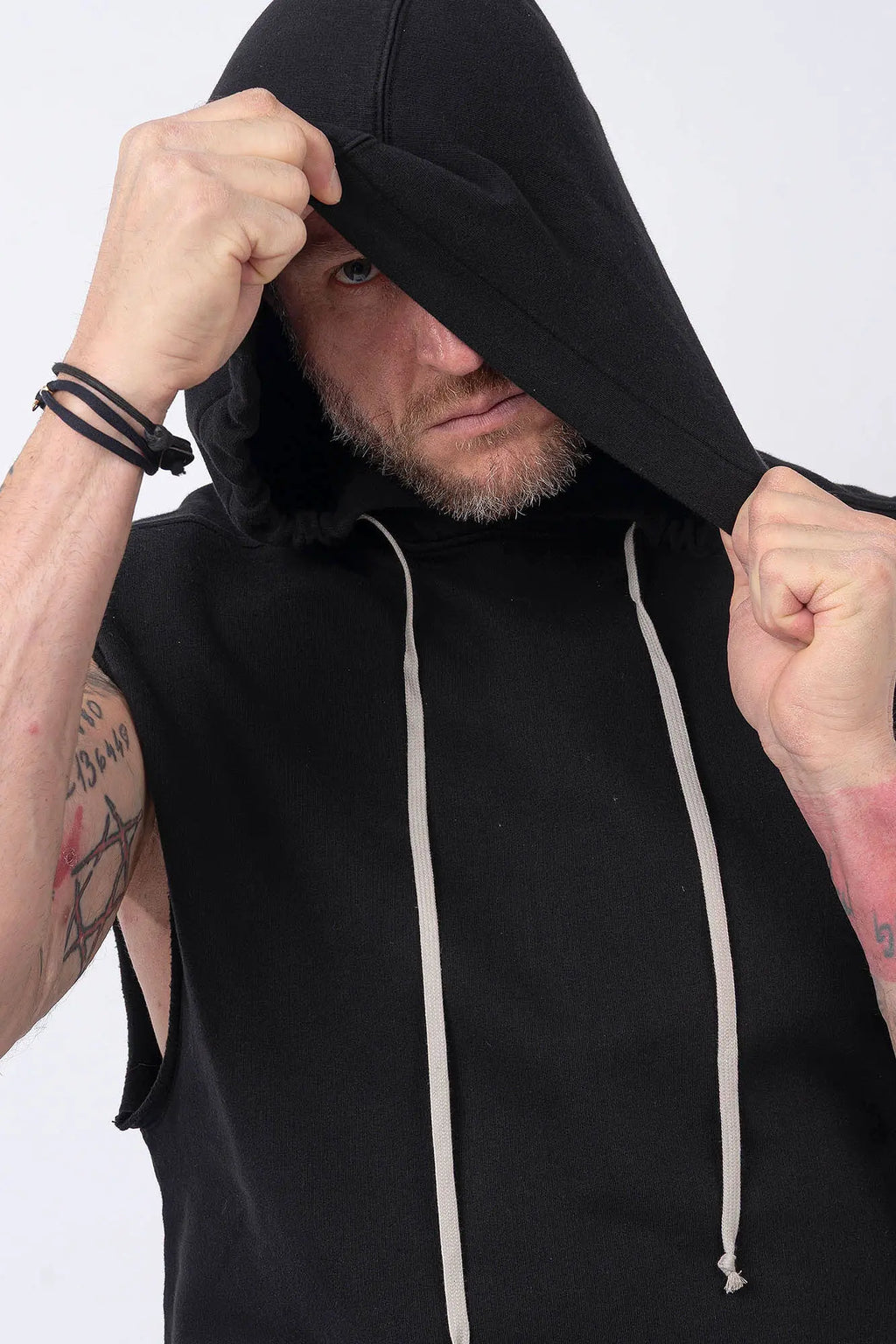 Rick Owens, Mens Temple Tunic,Hip Length,Sleeveless,Black Furka Heavy Sweatshirt Jersey,Large Hood With Drawstrings,Wide Square Body,Garment Dyed,GOTS Certified Organic Cotton,Front Portrait.
