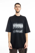 Rick Owens DRKSHDW Mens  T-Shirt , Jumbo Short Sleeve T-Shirt , Oversized Fit , Ribbed Crewneck , Below Hip Lenght , Elbow Lenght Short Sleeves , Signature Front Level Shoulder Seams , Temple of Love OWENSCORP Print , Black Heavy Cotton , Organic Cotton , Half Body Photo