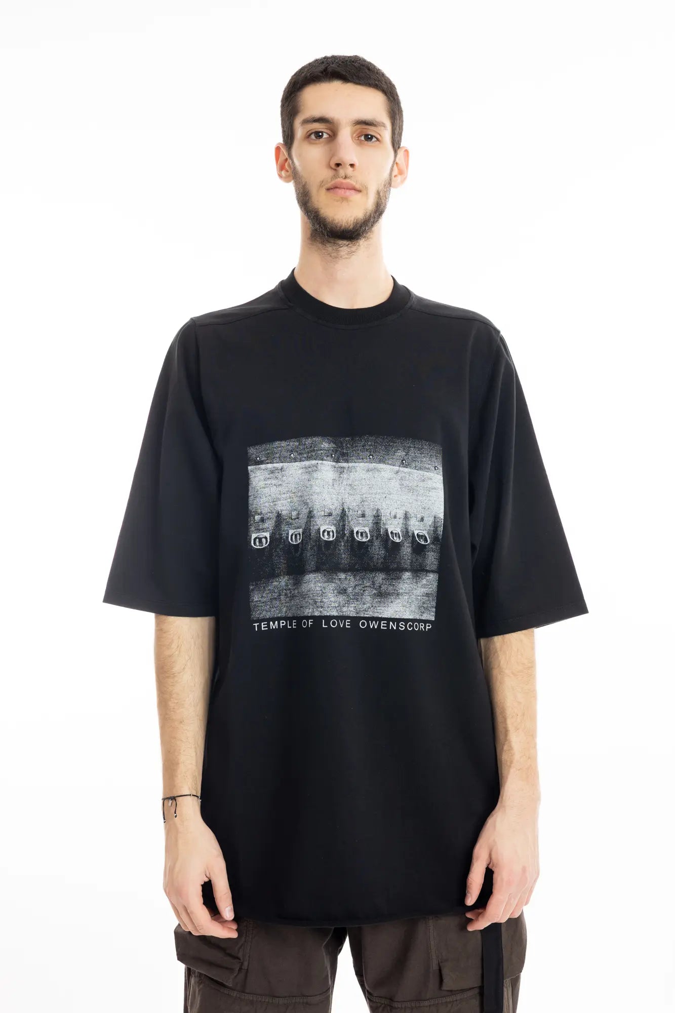 Rick Owens DRKSHDW Mens  T-Shirt , Jumbo Short Sleeve T-Shirt , Oversized Fit , Ribbed Crewneck , Below Hip Lenght , Elbow Lenght Short Sleeves , Signature Front Level Shoulder Seams , Temple of Love OWENSCORP Print , Black Heavy Cotton , Organic Cotton , Half Body Photo