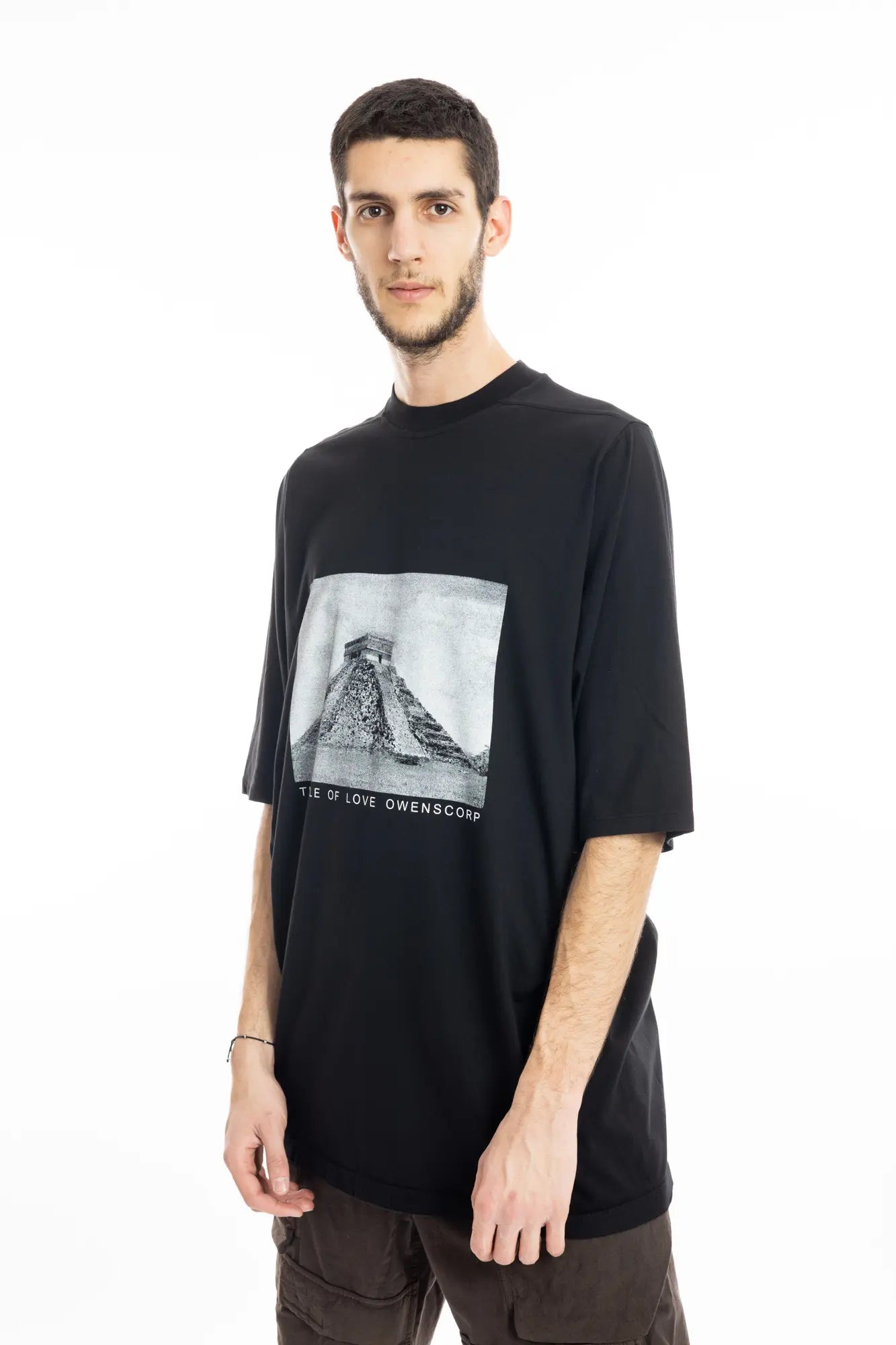 Rick Owens DRKSHDW Mens  T-Shirt , Jumbo Short Sleeve T-Shirt , Pyramid Graphic Print On Front  , Oversized Fit , Ribbed Crewneck , Below Hip Lenght , Elbow Lenght Short Sleeves , Signature Front Level Shoulder Seams , Temple of Love OWENSCORP Print , Black Heavy Cotton , Organic Cotton , Additional Side Angle Photo