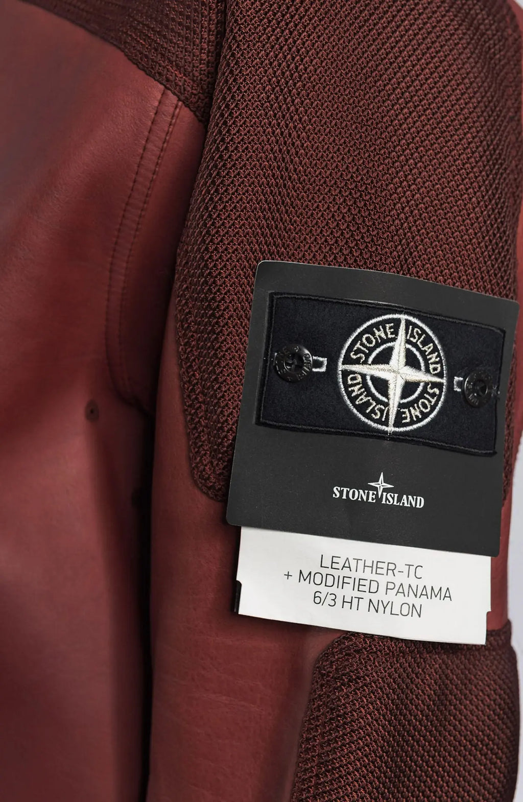 Stone Island Ghost, Male Leather Jacket, Dark Red Dyed Leather with Dark Red nylon details, Leather Jacket, Stone Island Bagde close-up.