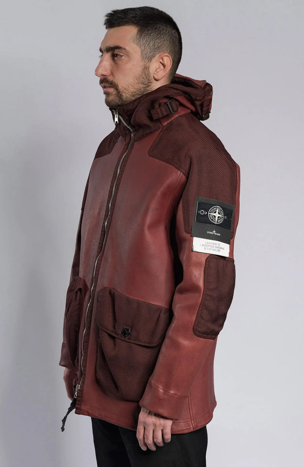 Stone Island Ghost, Male Leather Jacket, Dark Red Dyed Leather with Dark Red nylon details, Leather Jacket, Side Photograph. Stone Island Ghost Badge. 