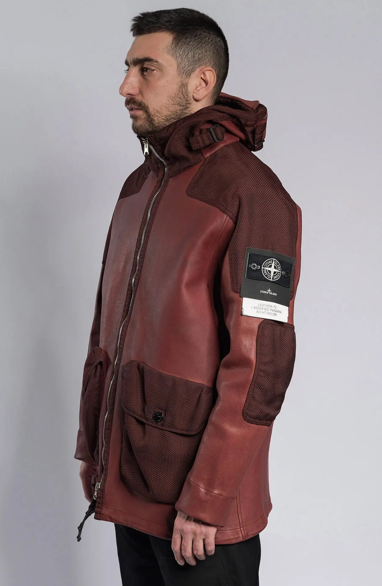 Stone Island Ghost, Male Leather Jacket, Dark Red Dyed Leather with Dark Red nylon details, Leather Jacket, Side Photograph. Stone Island Ghost Badge. 