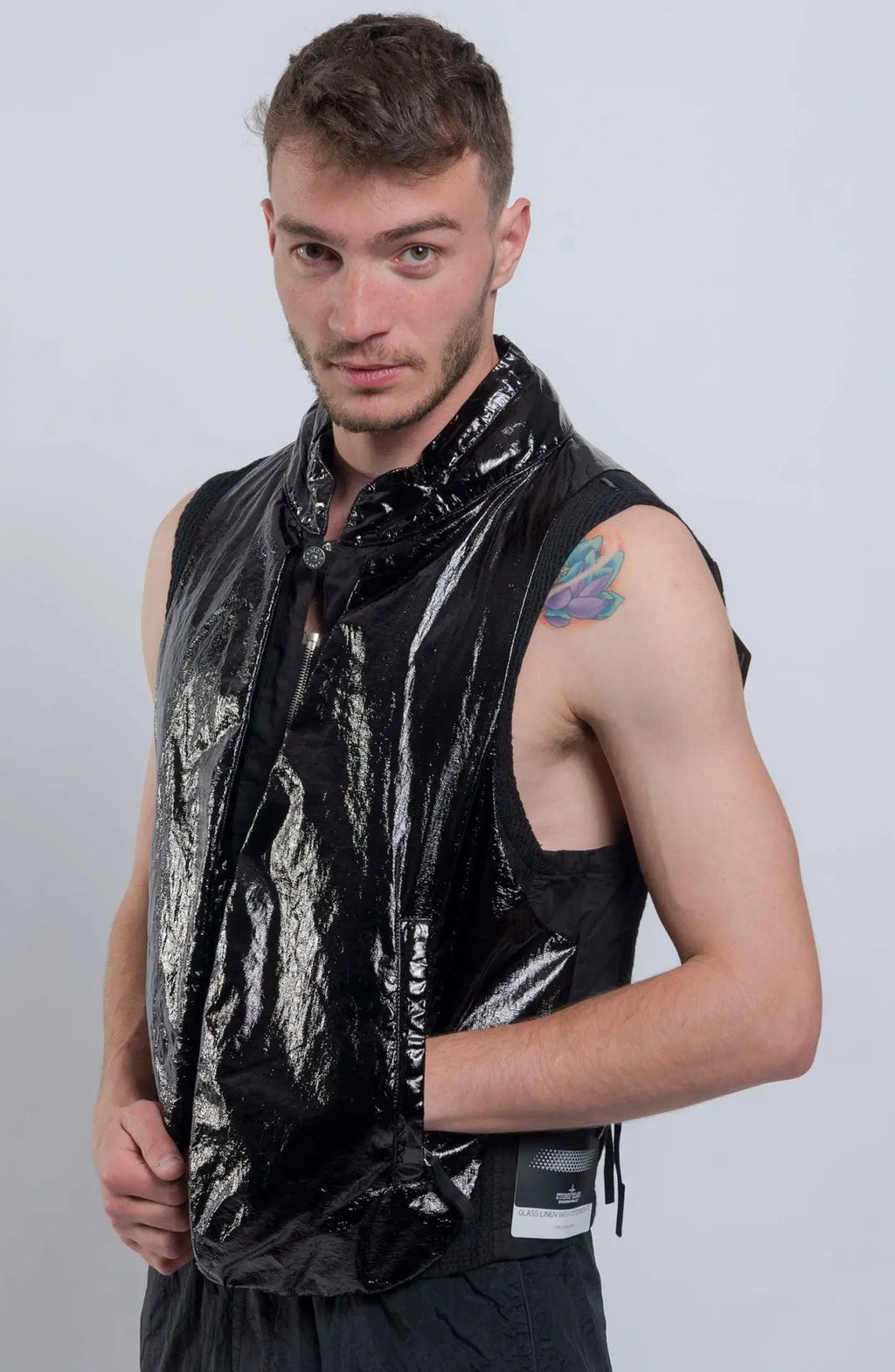 Stone Island Vest, Male, Shadow Project, Black, Pocket Detail, 3/4 front view photograph. 