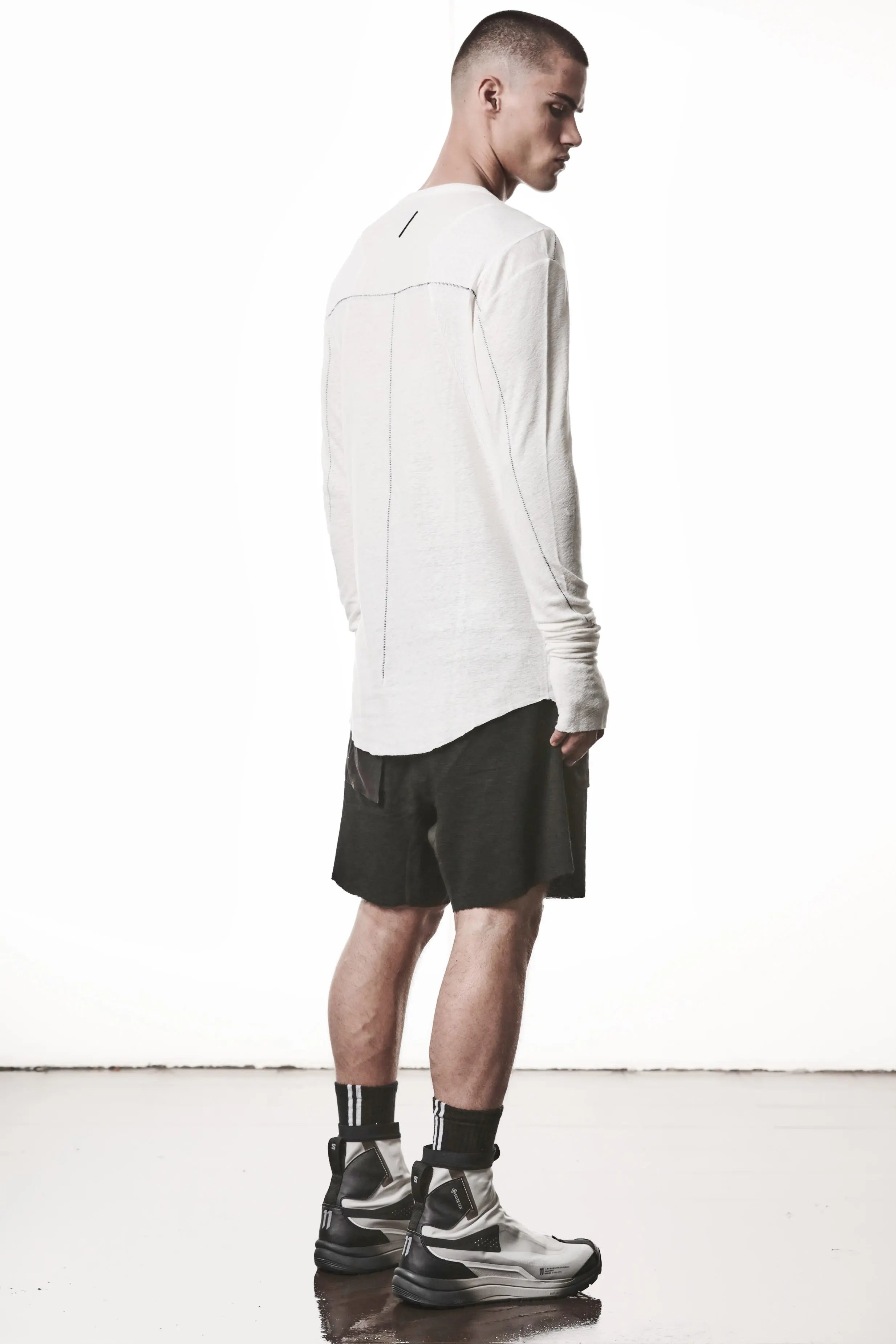 Thom Krom T-Shirt,Mens T-Shirt,Off White Cotton,Linen,Viscose,Logo Embroidery,Signature Back Seam, Round Crewneck ,Standard Length, Paneled Construction,Аsymmetrical Sleeve Seam,Extended Sleeves,Curved Hem Line,Extended Sleeves With Thumbhole Details,Side Angle Whole Body Photo