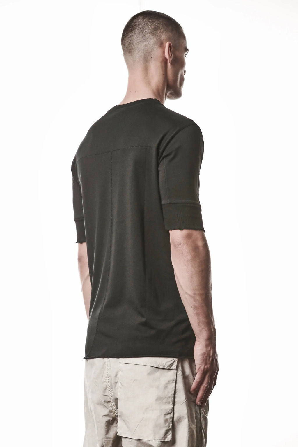 Thom Krom, Mens T-Shirt, Black, Cotton Modal Jersey, Ribbed Cuffs, Short Sleeves, Round Neck, Slim fit, 3/4 Back portrait view. 