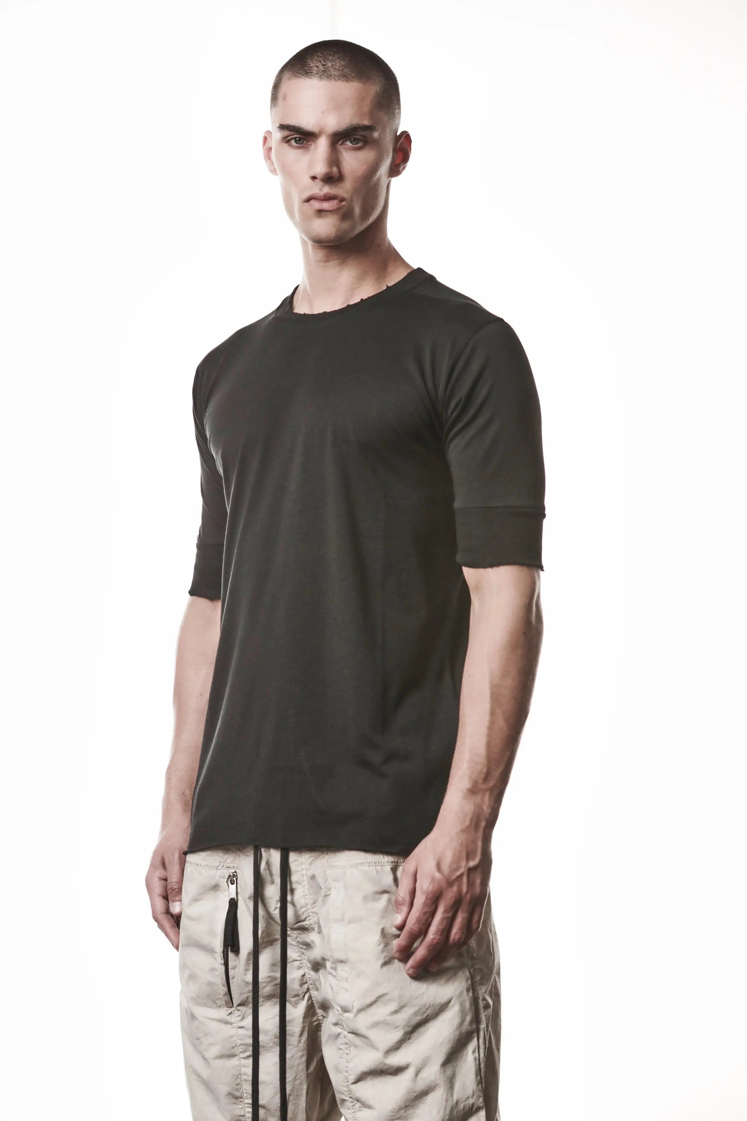 Thom Krom, Mens T-Shirt, Black, Cotton Modal Jersey, Ribbed Cuffs, Short Sleeves, Round Neck, Slim fit, 3/4 Front View. 
