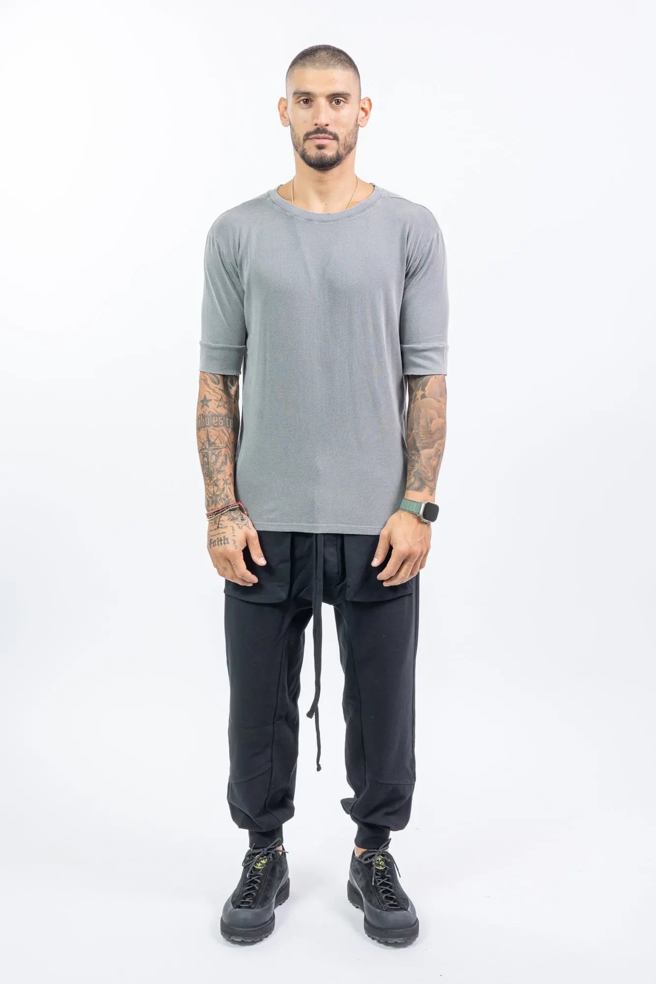 Thom Krom,Mens Cargo Pants,Multipocket Cargo,Adjustable Waistband With Drawstrings,Tapered Cuffs,Rib Knit Premium Cotton Blend,Dropped Inseam,Button Fly,Full Body.