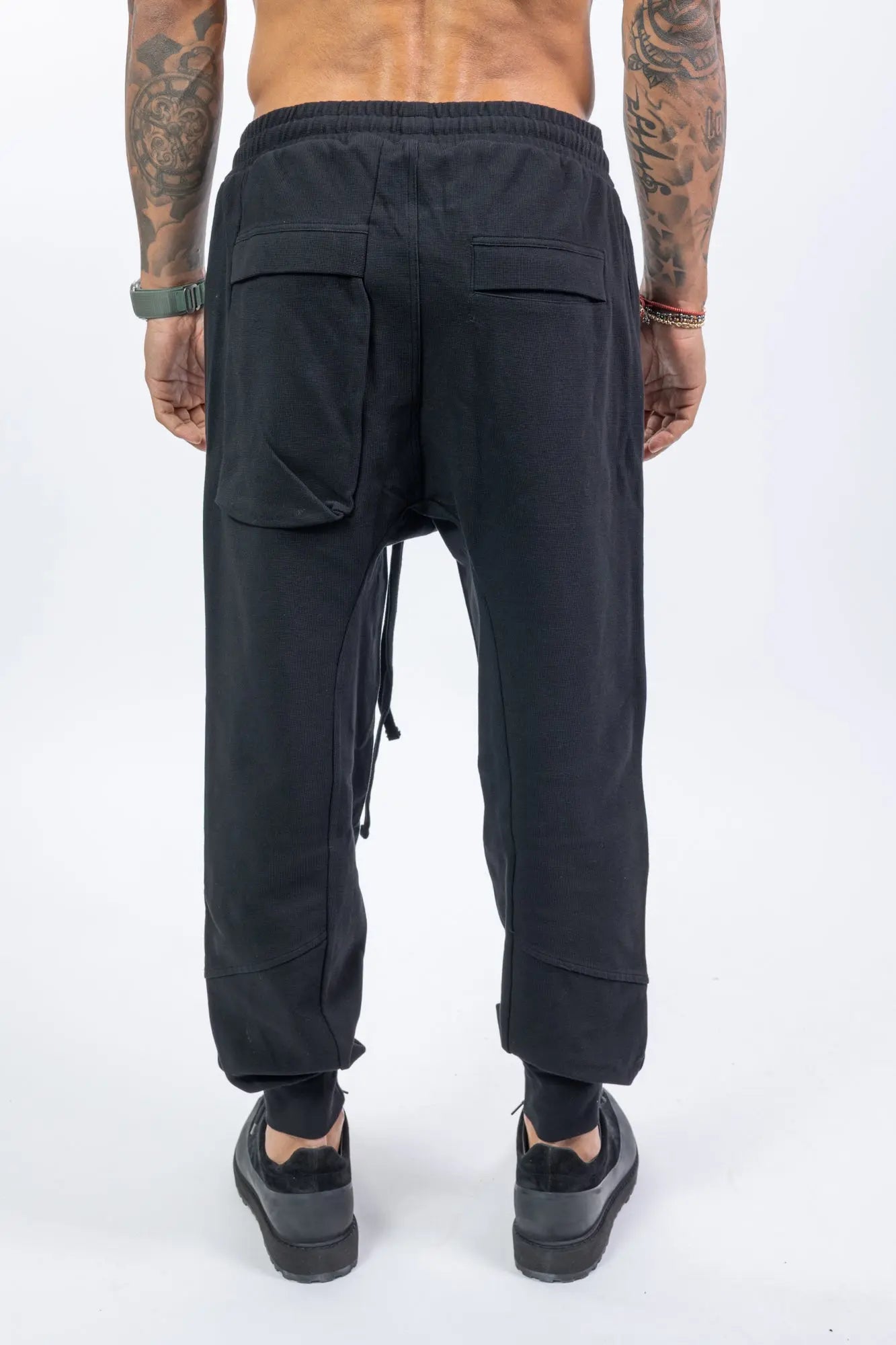 Thom Krom,Mens Cargo Pants,Multipocket Cargo,Adjustable Waistband With Drawstrings,Tapered Cuffs,Rib Knit Premium Cotton Blend,Dropped Inseam,Button Fly,Back Photo.
