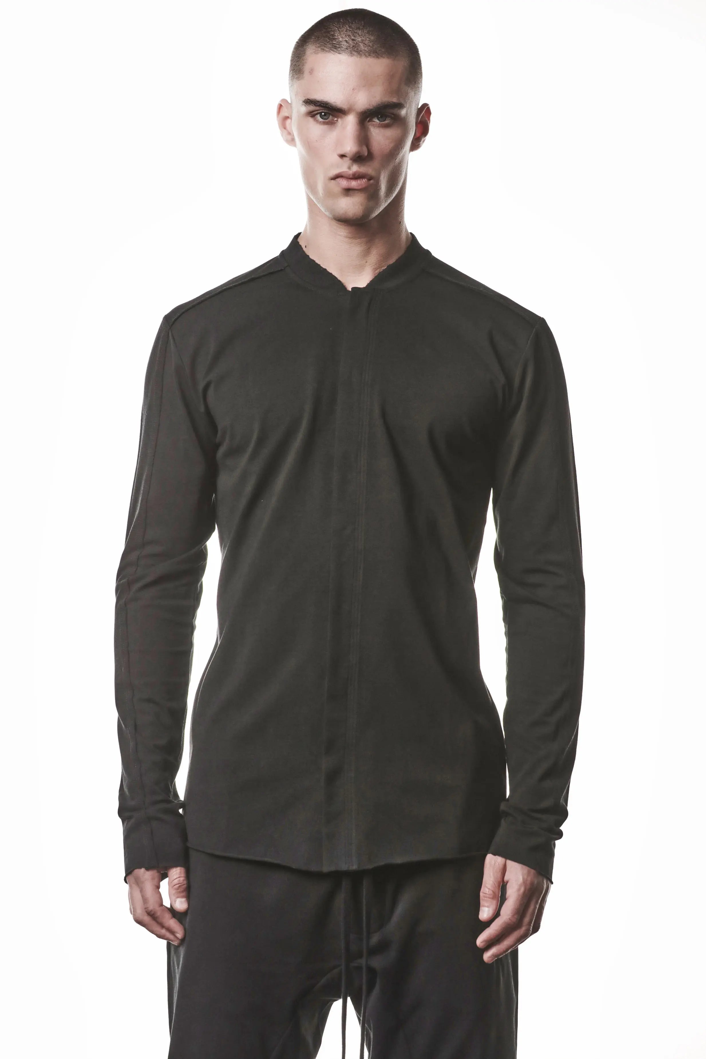 Thom Krom, Mens Shirt, Black, Stretch Sleeves, Exposed Seams, Stitched Logo, Thom/Krom, The Night is your friend, my love, Long Sleeves, Ribbed Collar, Front Portrait. 