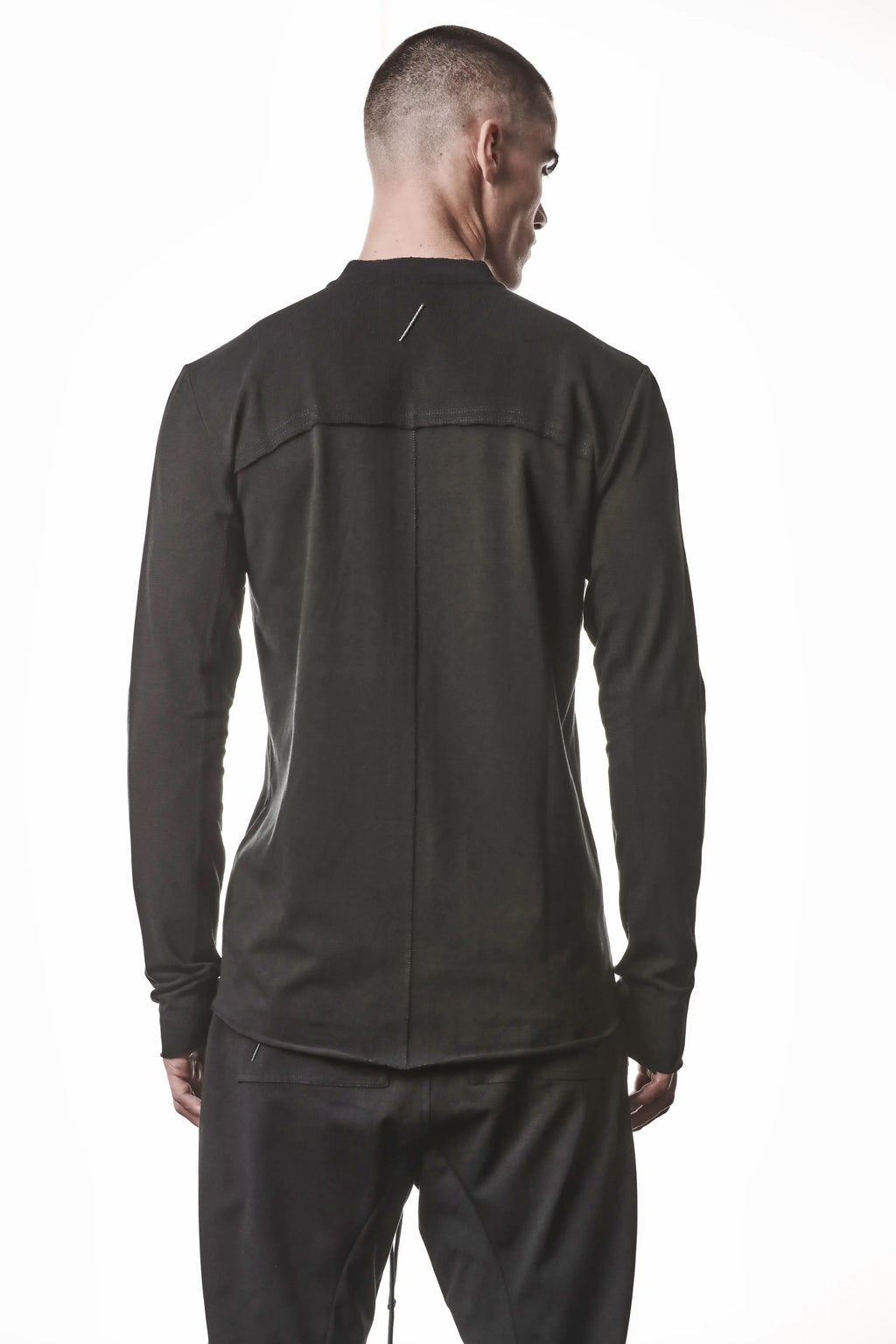 Thom Krom, Mens Shirt, Black, Stretch Sleeves, Exposed Seams, Stitched Logo, Thom/Krom, The Night is your friend, my love, Long Sleeves, Ribbed Collar, Back Portrait. 