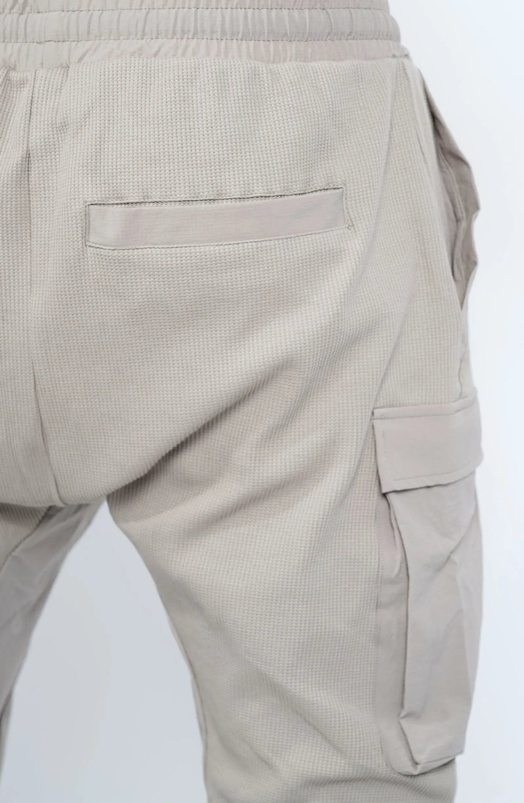 Thom Krom, Mens Pants, Moongery, Beige, Cargo Pockets, Large Pockets, Stretch Nylon Inserts, Elasticated Waistband, Drawstring, Elasticated Cuffs, Back Pocket Close-up. 