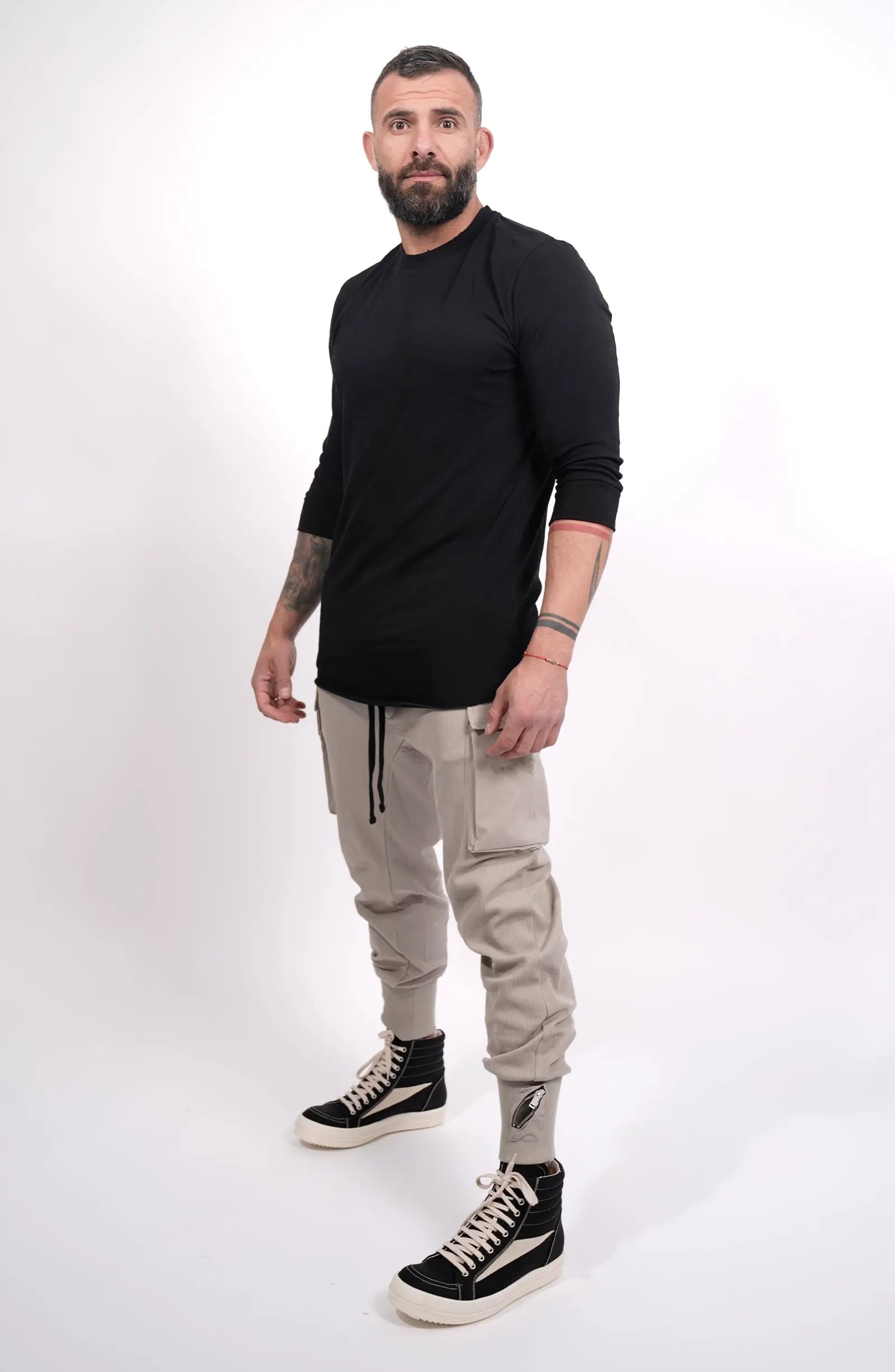 Thom Krom, Mens Pants, Moongery, Beige, Cargo Pockets, Large Pockets, Stretch Nylon Inserts, Elasticated Waistband, Drawstring, Elasticated Cuffs, Full Body Front 3/4 View. 