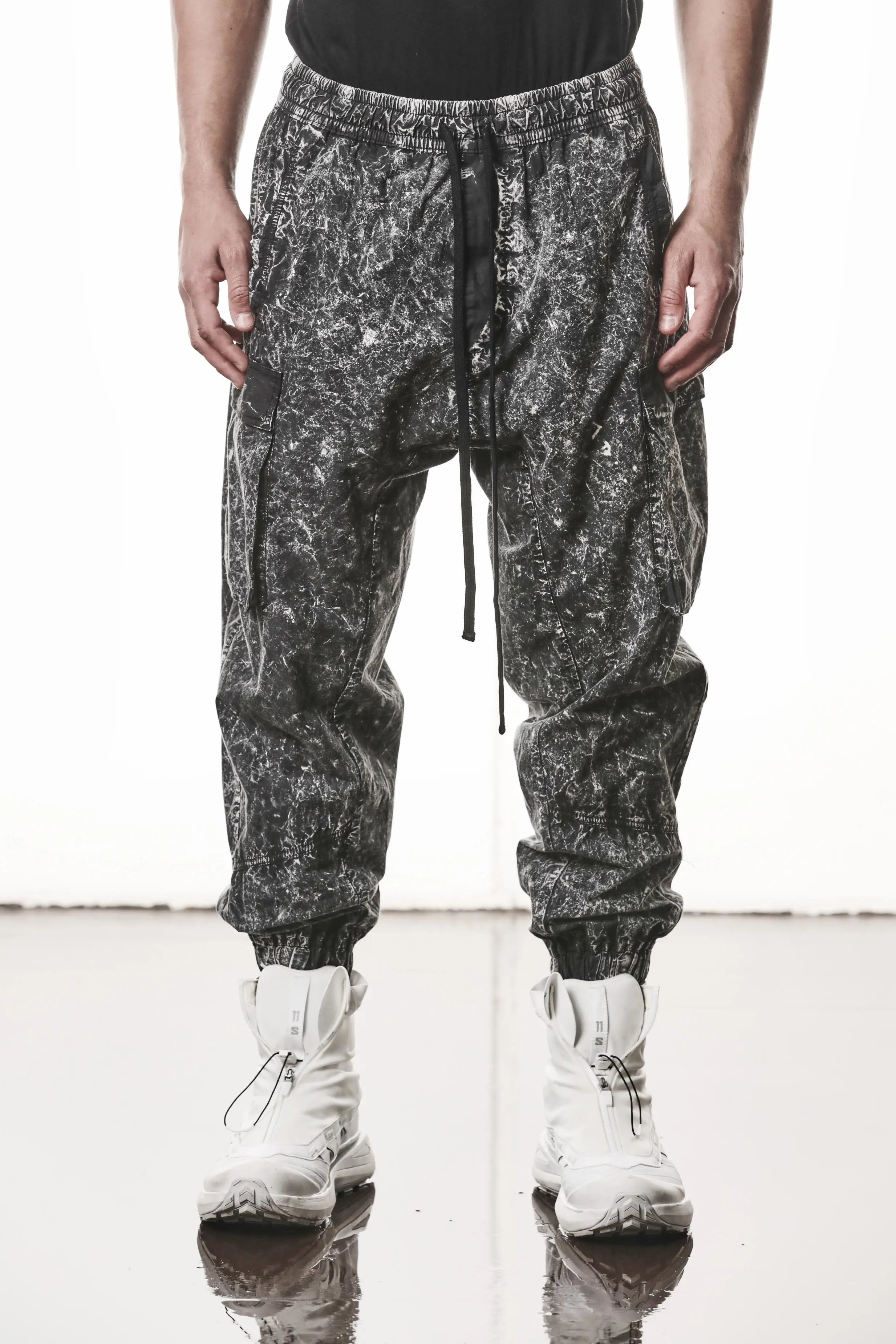 Thom Krom, Mens Trousers, Black, Cargo Pants, Zip Pockets, Side Pockets, Drawstring, Elasticated Waistband, Elasticated Ankle Cuffs, Drop-Crotch, Back Pockets, YKK Zippers, Front View. 