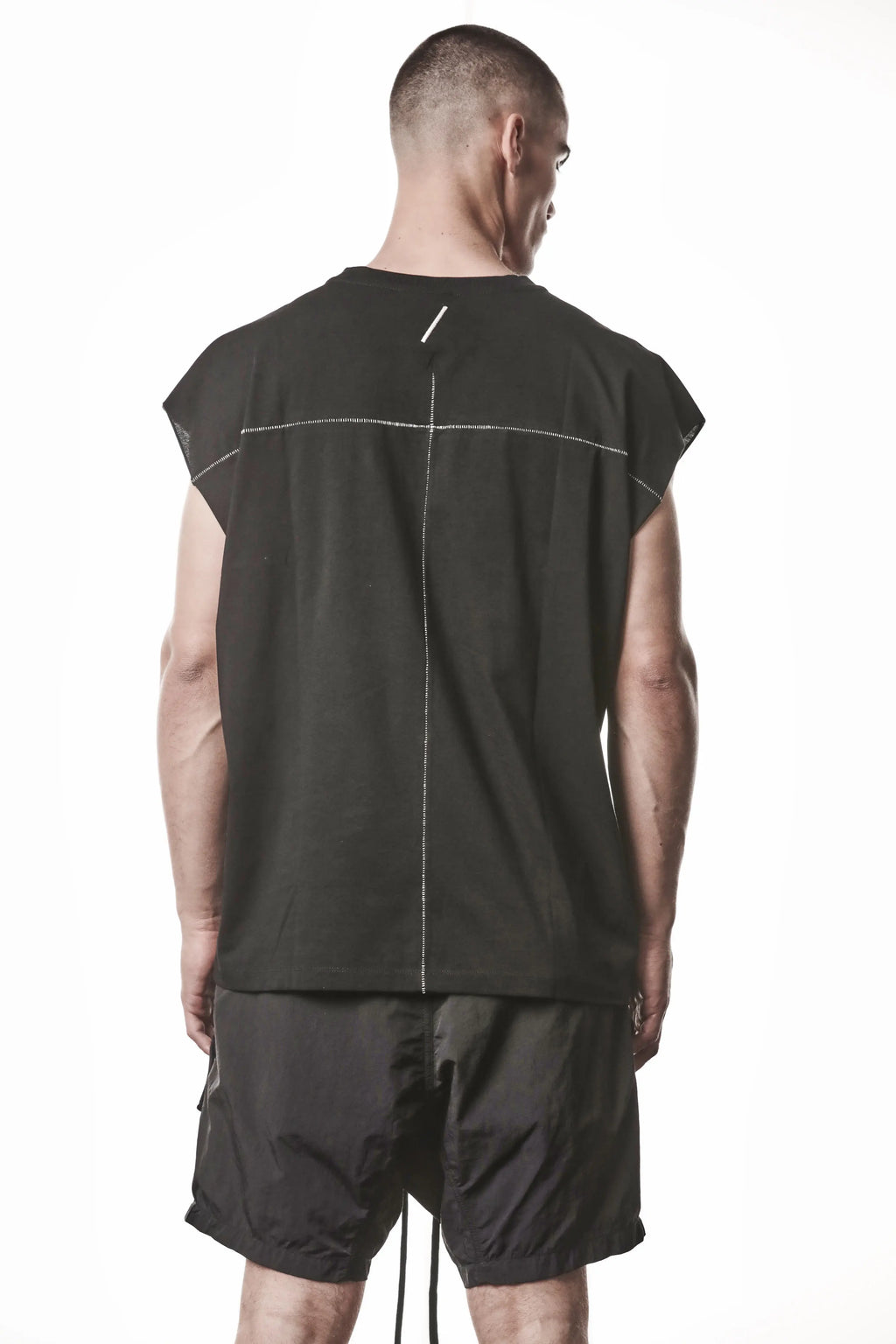 Thom Krom, Mens T-Shirt, Dark Used Grey, Dropped Shoulders, 100%Cotton, Cotton-Elastane Blend, Ribbed Neckline, Crewneck, Round Neck, Ribbed Hem, Breathable, Back Portrait Photo. 