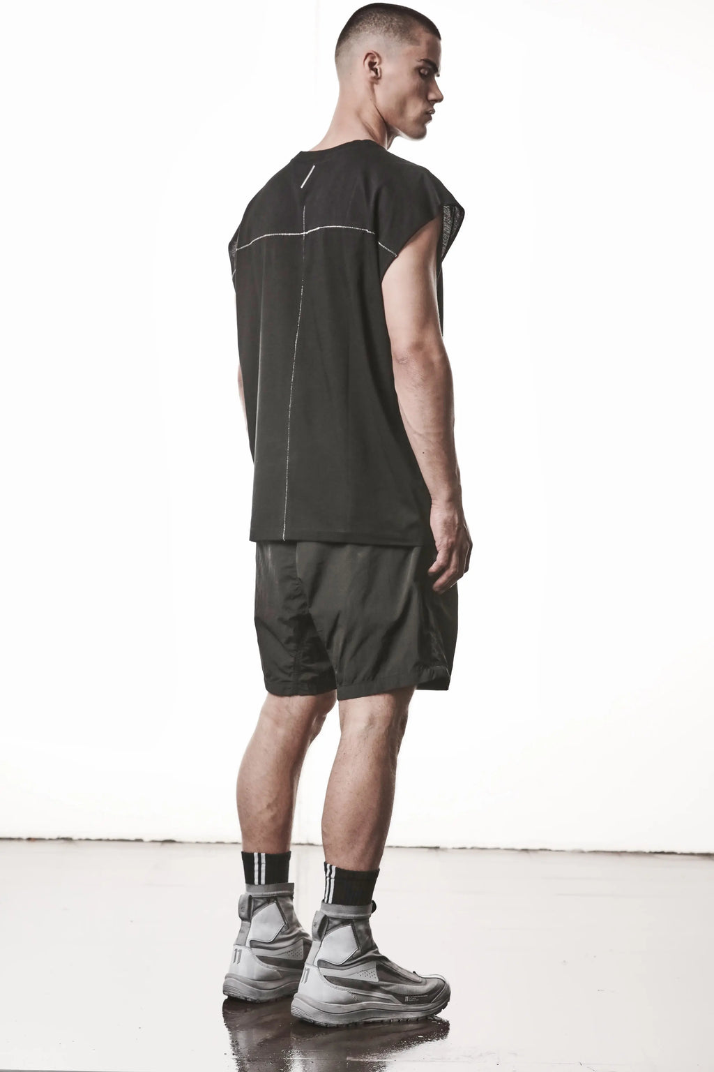 Thom Krom, Mens T-Shirt, Dark Used Grey, Dropped Shoulders, 100%Cotton, Cotton-Elastane Blend, Ribbed Neckline, Crewneck, Round Neck, Ribbed Hem, Breathable, Back 3/4 View. 