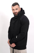 Thom Krom, Mens Hoodie, Black, Hooded Sweatshirt, Cotton, Stretch Nylon Inserts, Stretch Cotton Cuffs and Inserts, Cotton Jersey, Thumbholes, Mock Neck, Sleeve Zip Pocket, Front Crossed Hands Portrait View. 