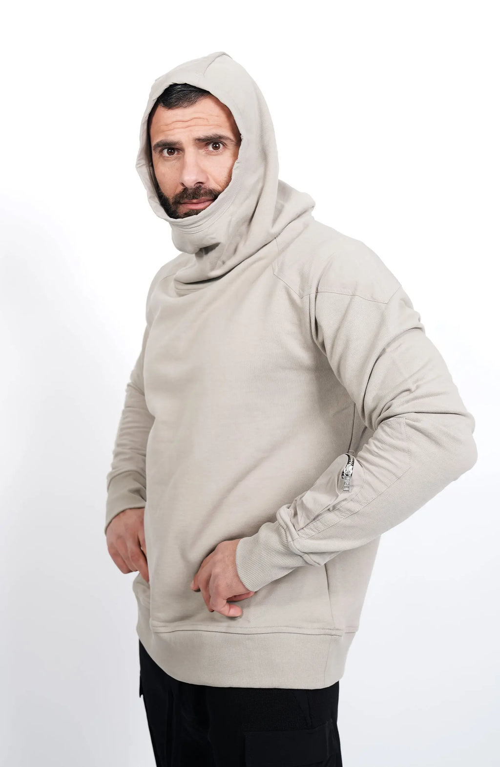 Thom Krom, Mens Hoodie, Black, Hooded Sweatshirt, Cotton, Stretch Nylon Inserts, Stretch Cotton Cuffs and Inserts, Cotton Jersey, Thumbholes, Mock Neck, Sleeve Zip Pocket, Hooded Side View. 