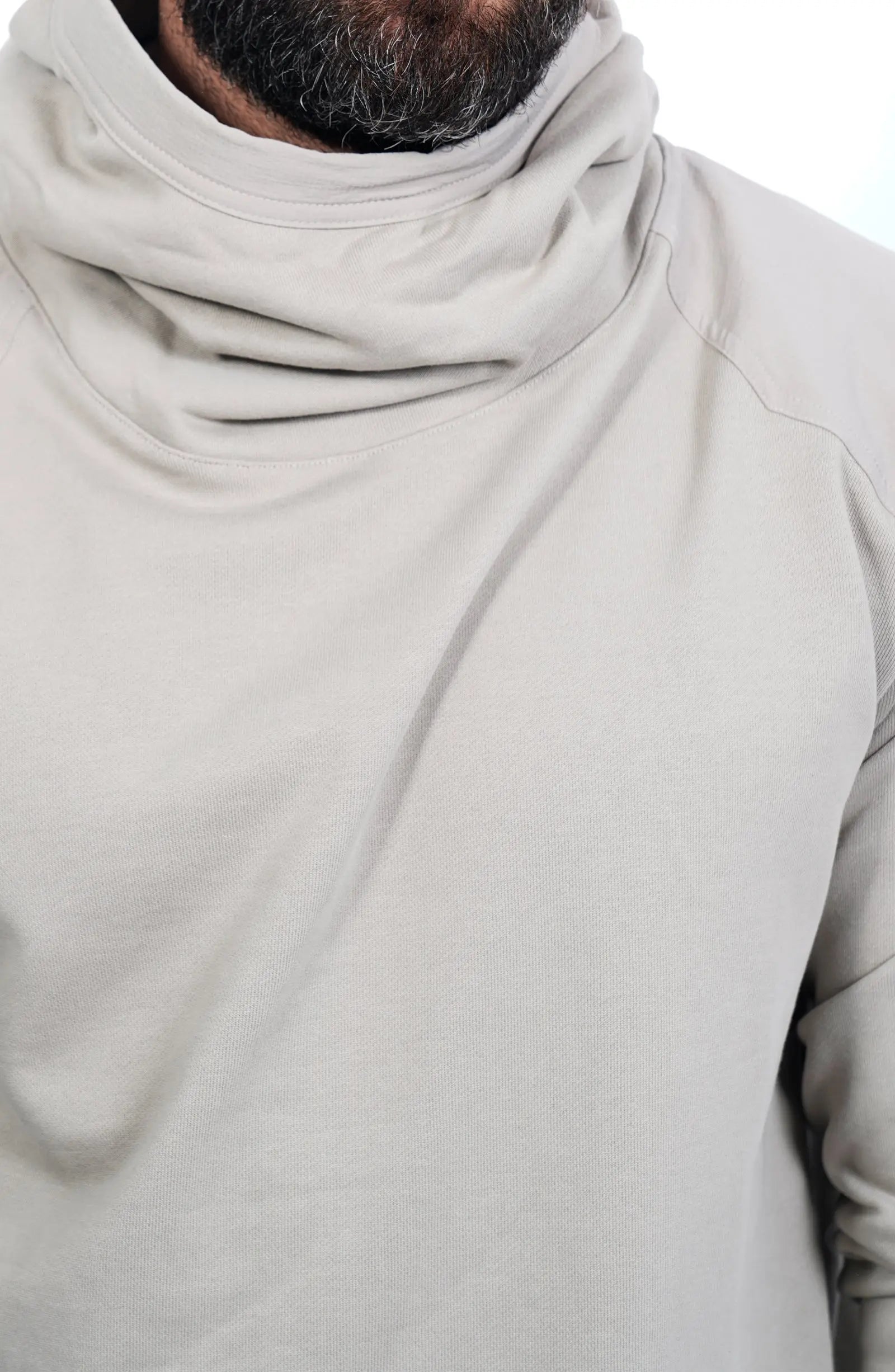 Thom Krom, Mens Hoodie, Black, Hooded Sweatshirt, Cotton, Stretch Nylon Inserts, Stretch Cotton Cuffs and Inserts, Cotton Jersey, Thumbholes, Mock Neck, Sleeve Zip Pocket, Fabric Close-up. 