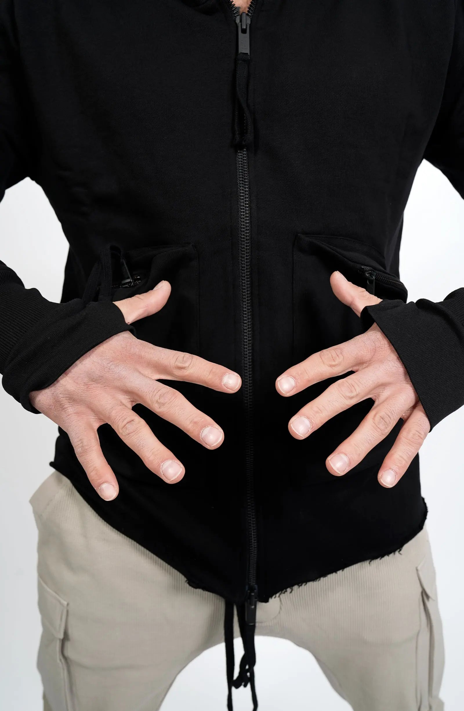 Thom Krom, Mens Hooded Jacket, Black, Bellows Pockets, Zip Pockets, YKK Zippers, Hood, Thumbholes, 100% Cotton, Vislon Zippers, Hands Close-up. 