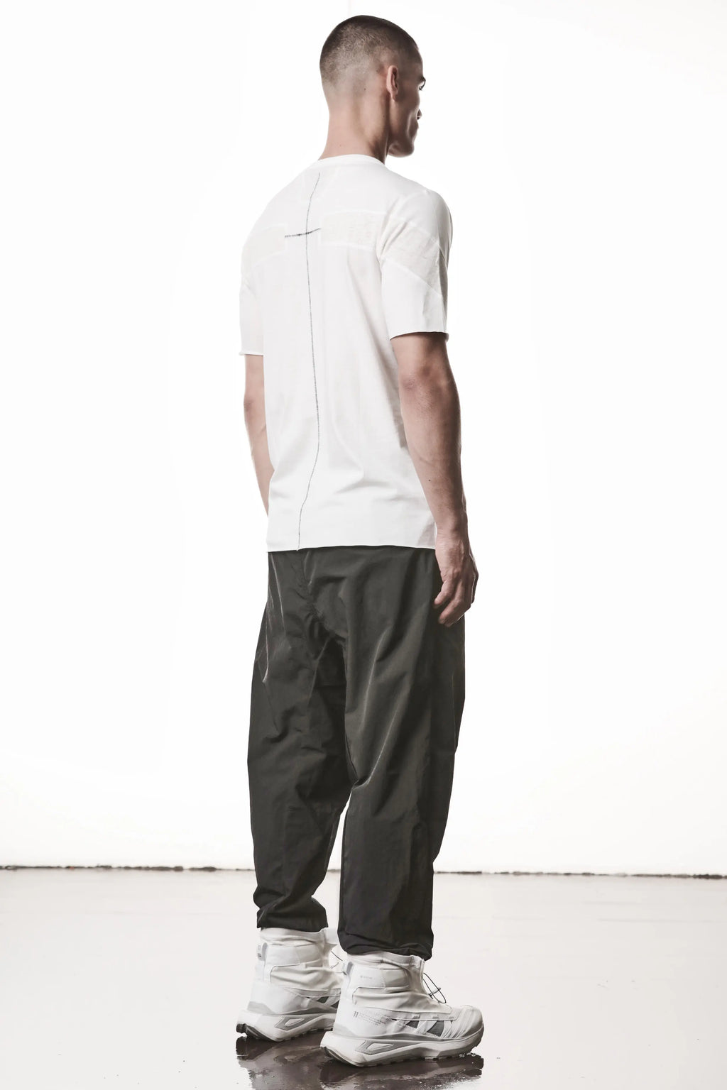Thom Krom, Mens T-Shirt, White, Cotton Jersey with breathability Inserts, Viscose Linen Inserts, Crewneck, Short Sleeves, Lightweight, 100% Cotton, Signature Cross Black Seams, The Night is your friend, my love, 3/4 Back Photo. 
