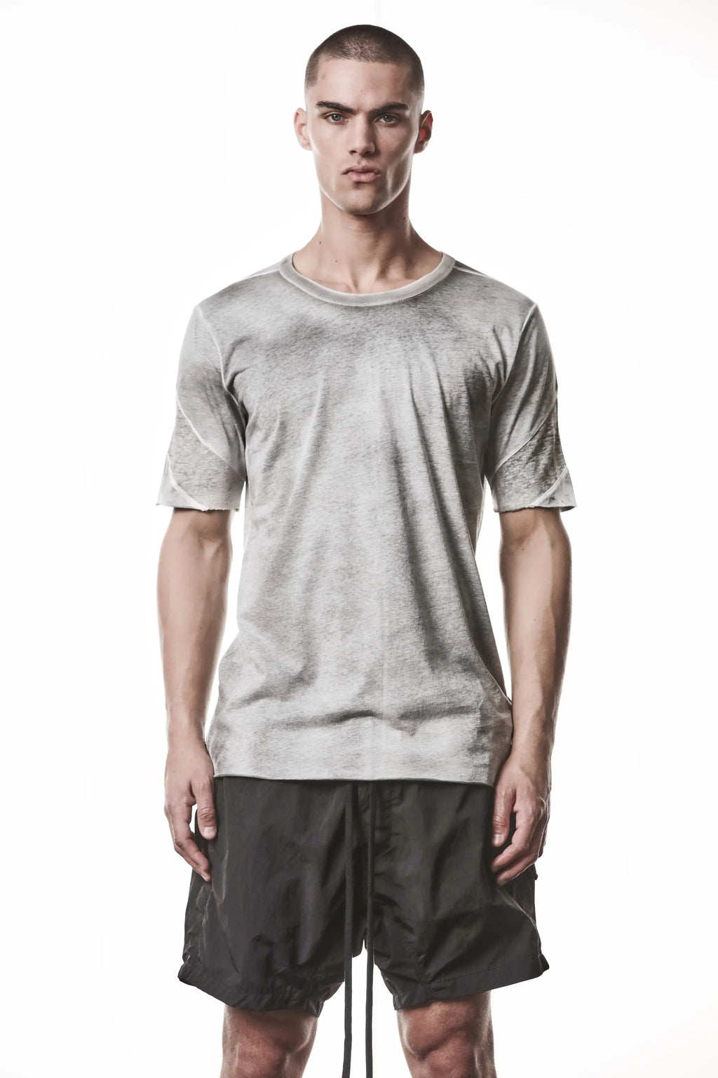 Thom Krom, Mens T-Shirt, Spray Grey, Cotton Jersey with breathability Inserts, Viscose Linen Inserts, Crewneck, Short Sleeves, Lightweight, 100% Cotton, Signature Cross Back Seams, The Night is your friend, my love, Front Portrait. 