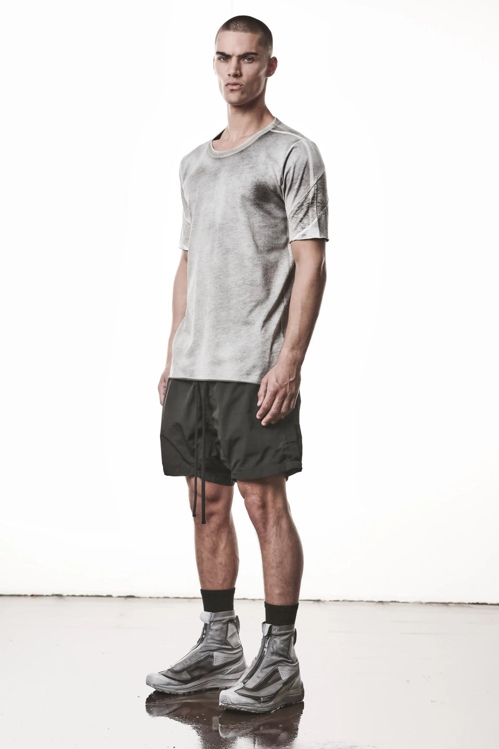 Thom Krom, Mens T-Shirt, Spray Grey, Cotton Jersey with breathability Inserts, Viscose Linen Inserts, Crewneck, Short Sleeves, Lightweight, 100% Cotton, Signature Cross Back Seams, The Night is your friend, my love, Full Body 3/4 View. 