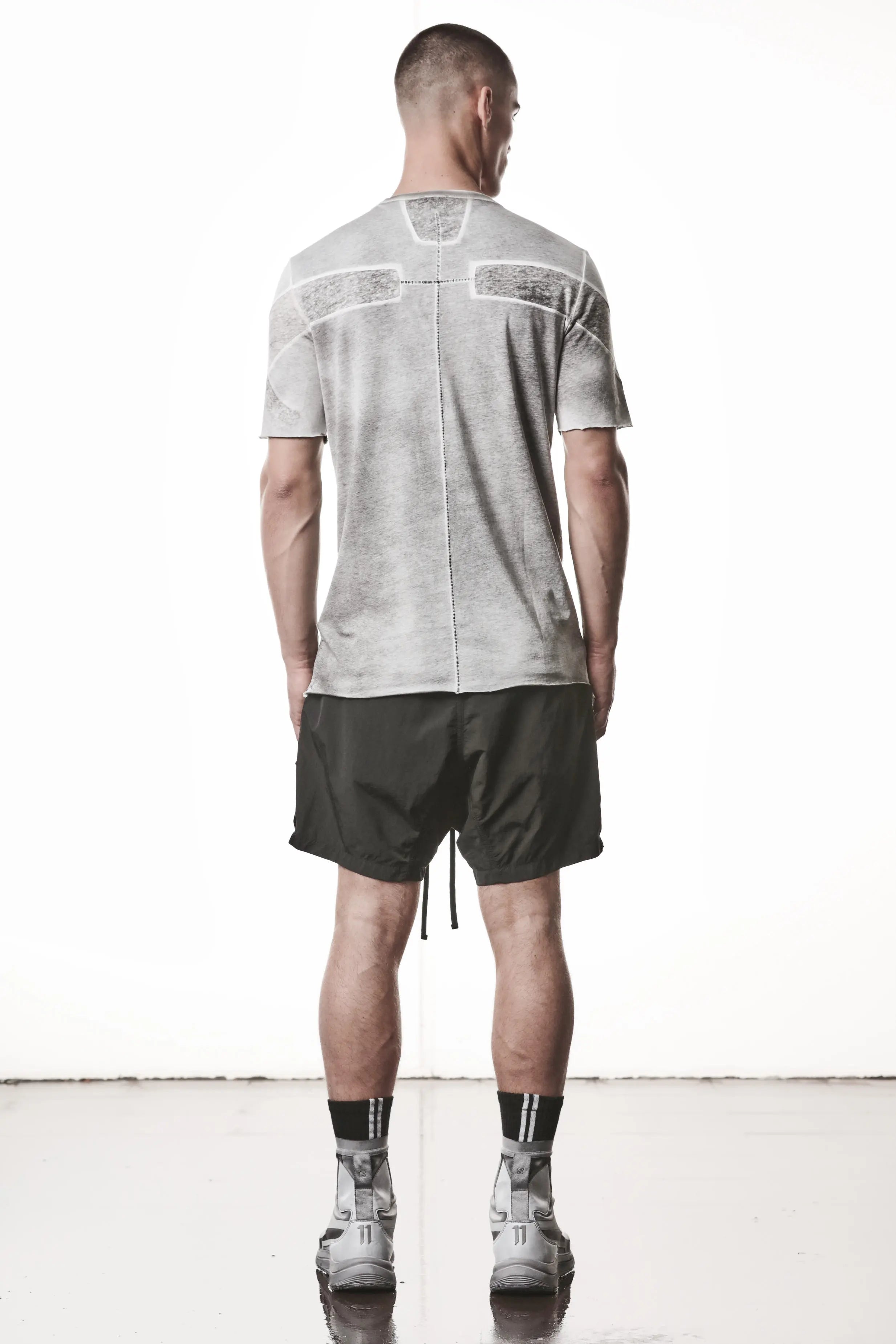 Thom Krom, Mens T-Shirt, Spray Grey, Cotton Jersey with breathability Inserts, Viscose Linen Inserts, Crewneck, Short Sleeves, Lightweight, 100% Cotton, Signature Cross Back Seams, The Night is your friend, my love, Full Body Back Photo. 