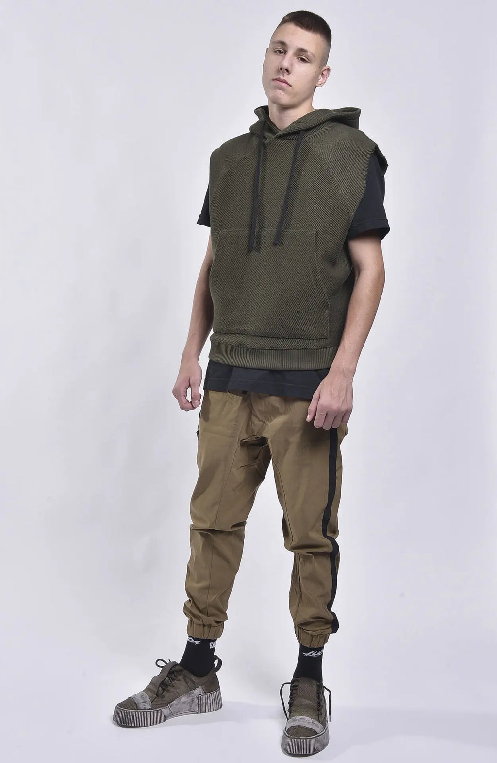 Thom Krom, Mens Vest, Green, Hooded, Sleeveless Hoodie, Hooded Sleveless Sweatshirt, Drawstring Hood, Front Pocket, Ribbed Hem, Raglan Sleeves, Raw-Cut Sleeve Holes, Full Body Side Step Photo. 