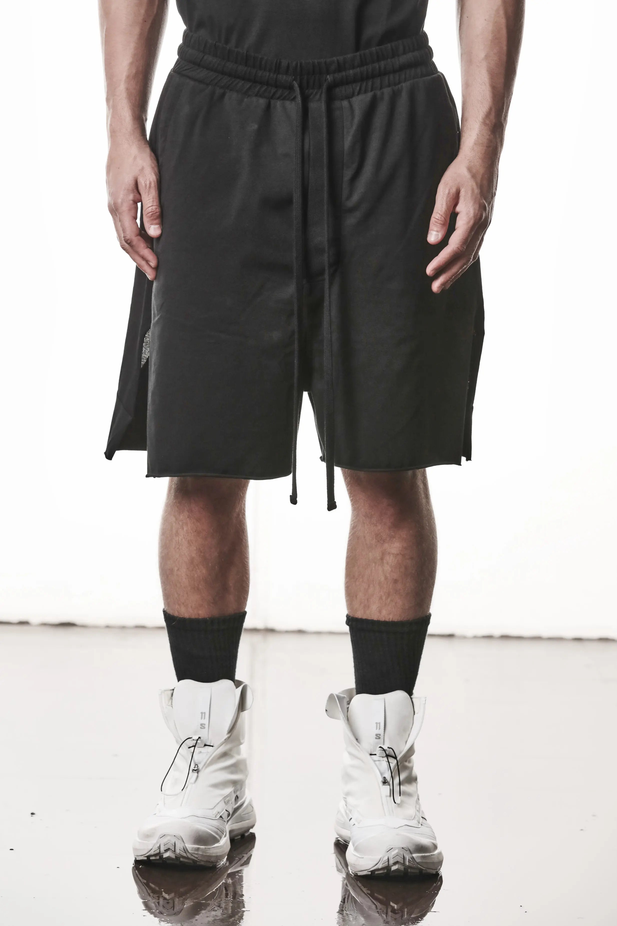 Thom Krom, Mens Shorts, Black, Stretch Cotton, Cotton-Elastane Blend, Spandex, Elasticated Waistband, Drawstring, Side Pockets, Raw-Cut Side Slits, Front Portrait. 