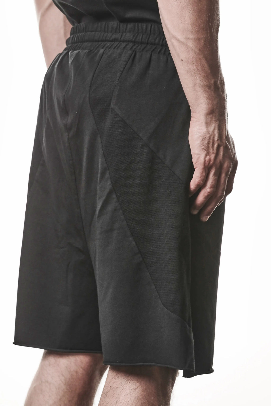 Thom Krom, Mens Shorts, Black, Stretch Cotton, Cotton-Elastane Blend, Spandex, Elasticated Waistband, Drawstring, Side Pockets, Raw-Cut Side Slits, Back 3/4 View Close-up. 