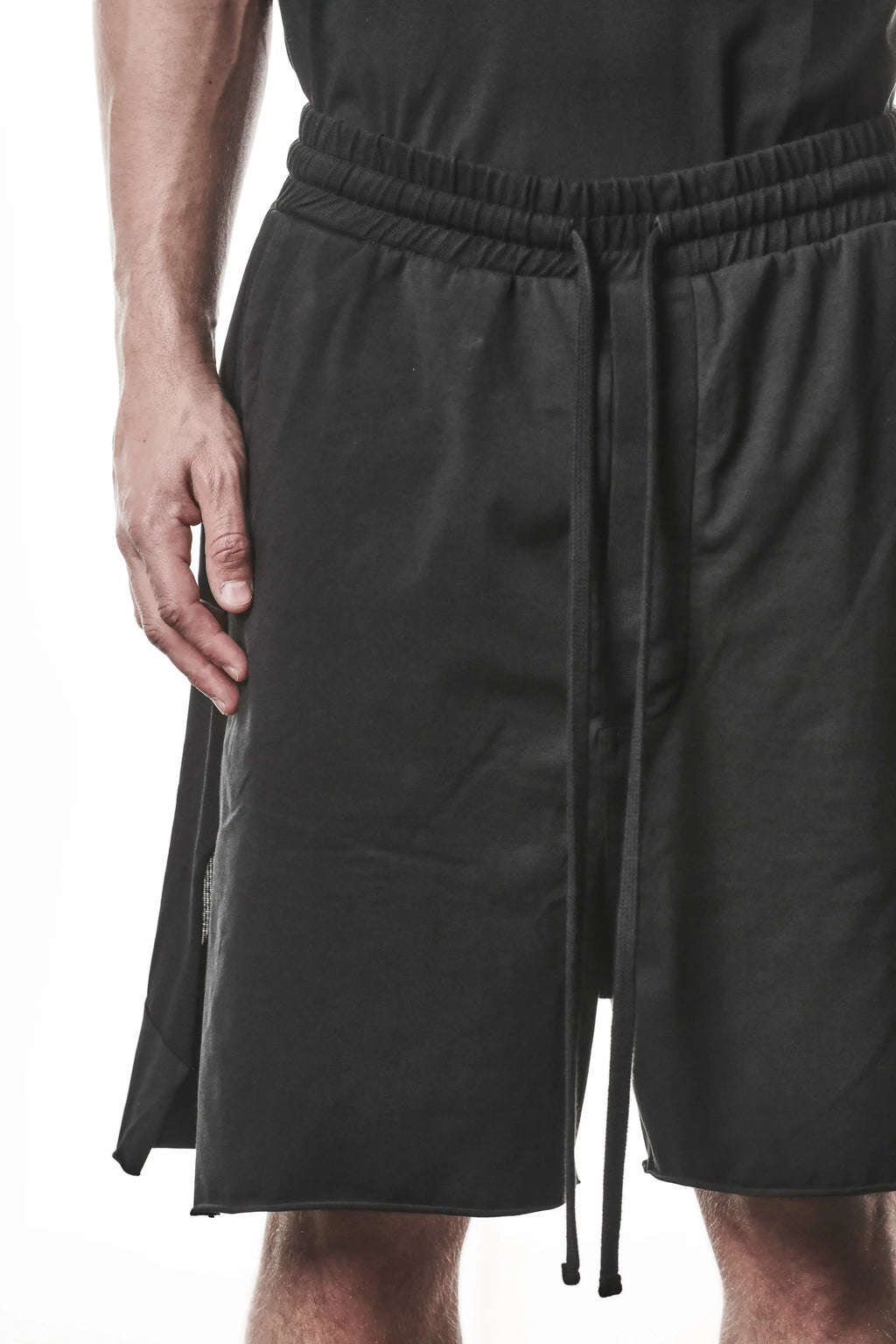 Thom Krom, Mens Shorts, Black, Stretch Cotton, Cotton-Elastane Blend, Spandex, Elasticated Waistband, Drawstring, Side Pockets, Raw-Cut Side Slits, Front Close-up View. 