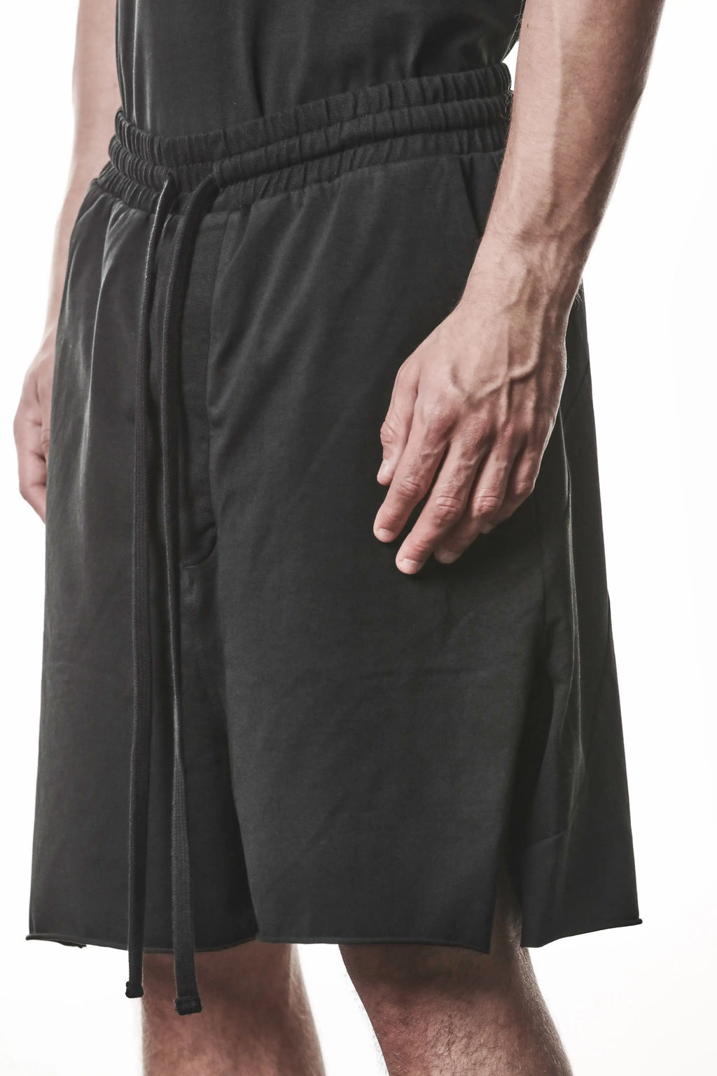 Thom Krom, Mens Shorts, Black, Stretch Cotton, Cotton-Elastane Blend, Spandex, Elasticated Waistband, Drawstring, Side Pockets, Raw-Cut Side Slits, Front 3/4 View Close-up. 
