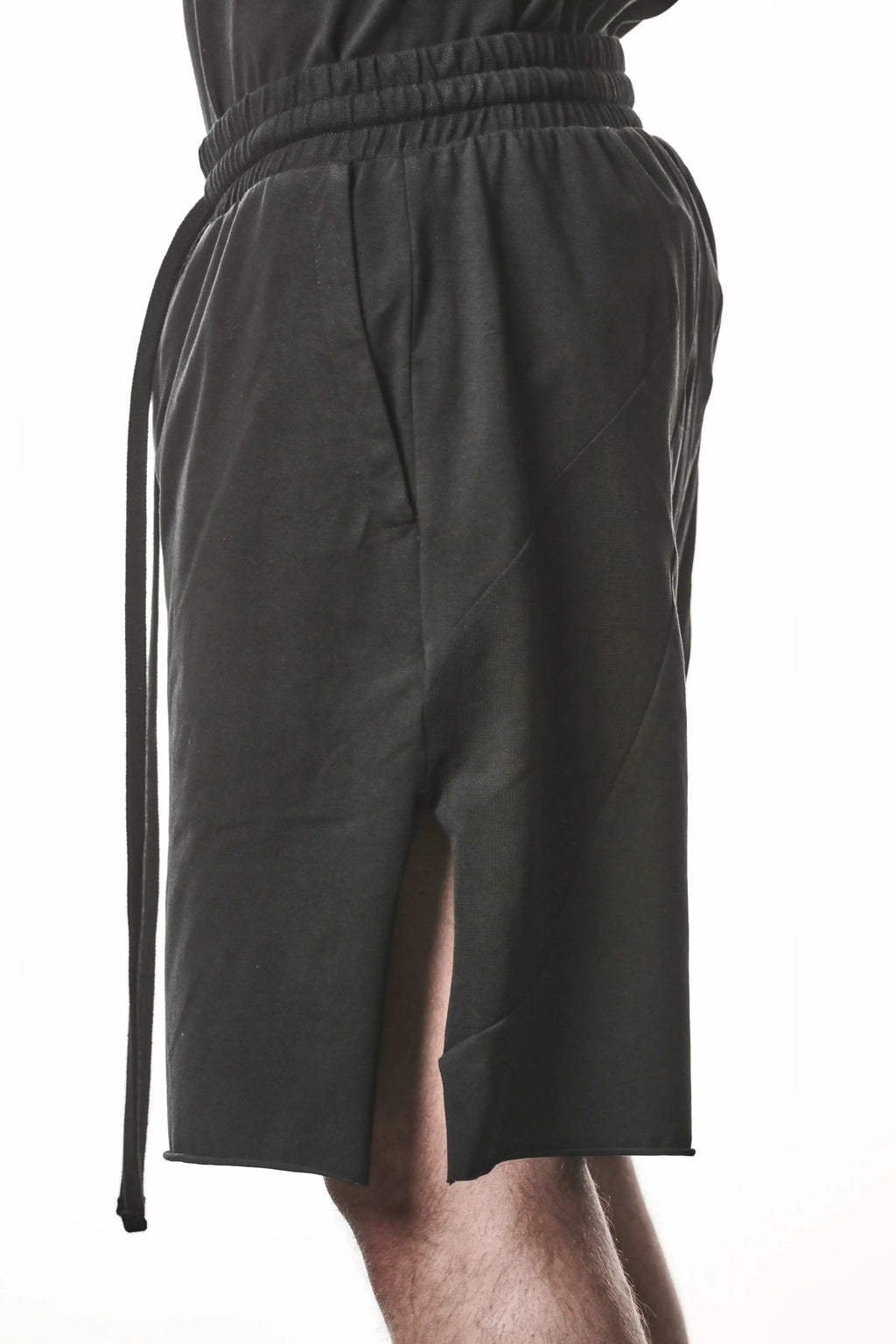 Thom Krom, Mens Shorts, Black, Stretch Cotton, Cotton-Elastane Blend, Spandex, Elasticated Waistband, Drawstring, Side Pockets, Raw-Cut Side Slits, Close-up Side View. 