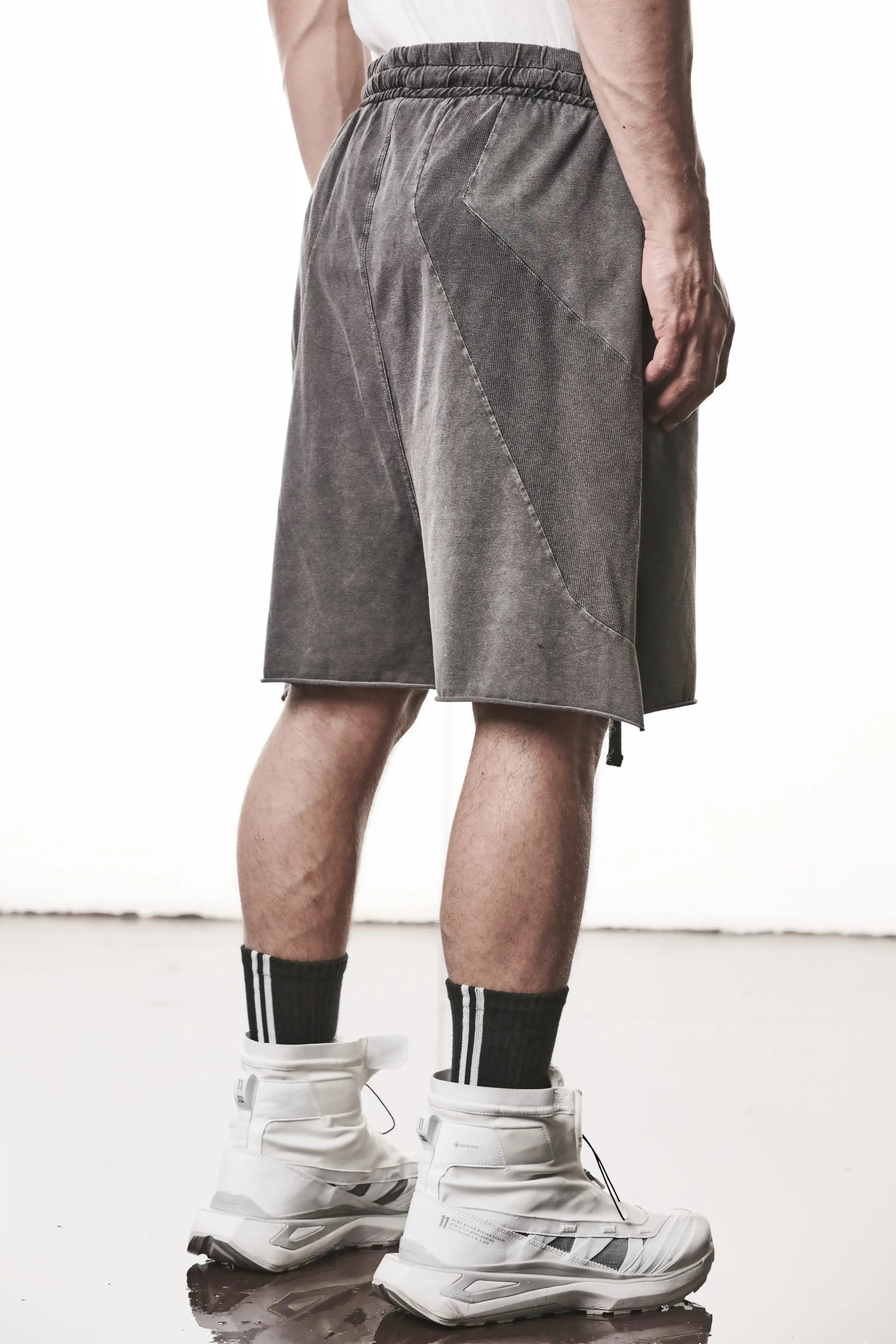 Thom Krom, Mens Shorts, Dark Used Grey, Stretch Cotton, Cotton-Elastane Blend, Spandex, Elasticated Waistband, Drawstring, Side Pockets, Raw-Cut Side Slits, Back 3/4 Inserts View. 