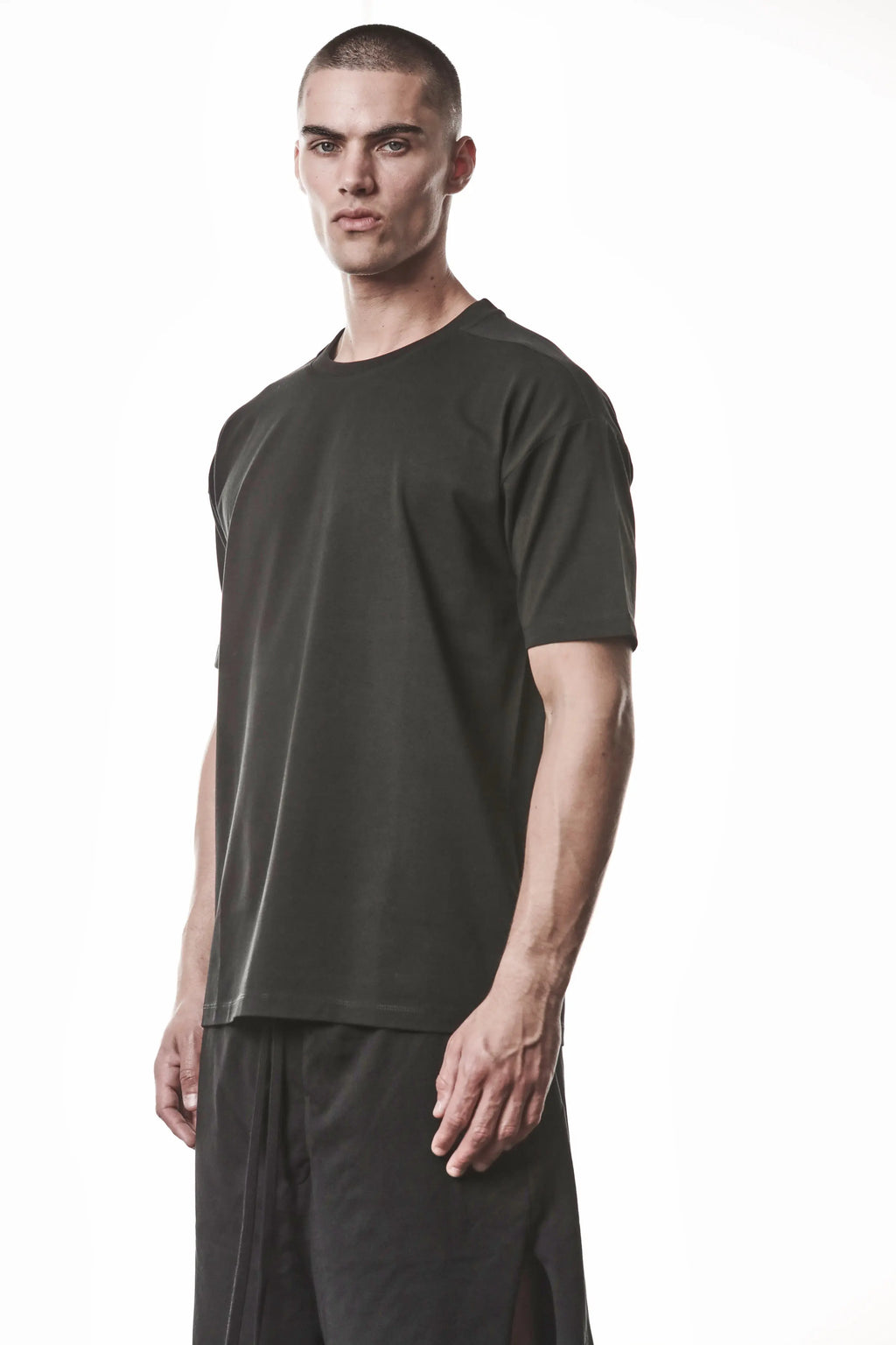 Thom Krom, Mens T-Shirt, Black, Cotton Elastane/Spandex, Short Sleeves, 100% Cotton, Reflective Print, Back Print, 3/4 Front View. 