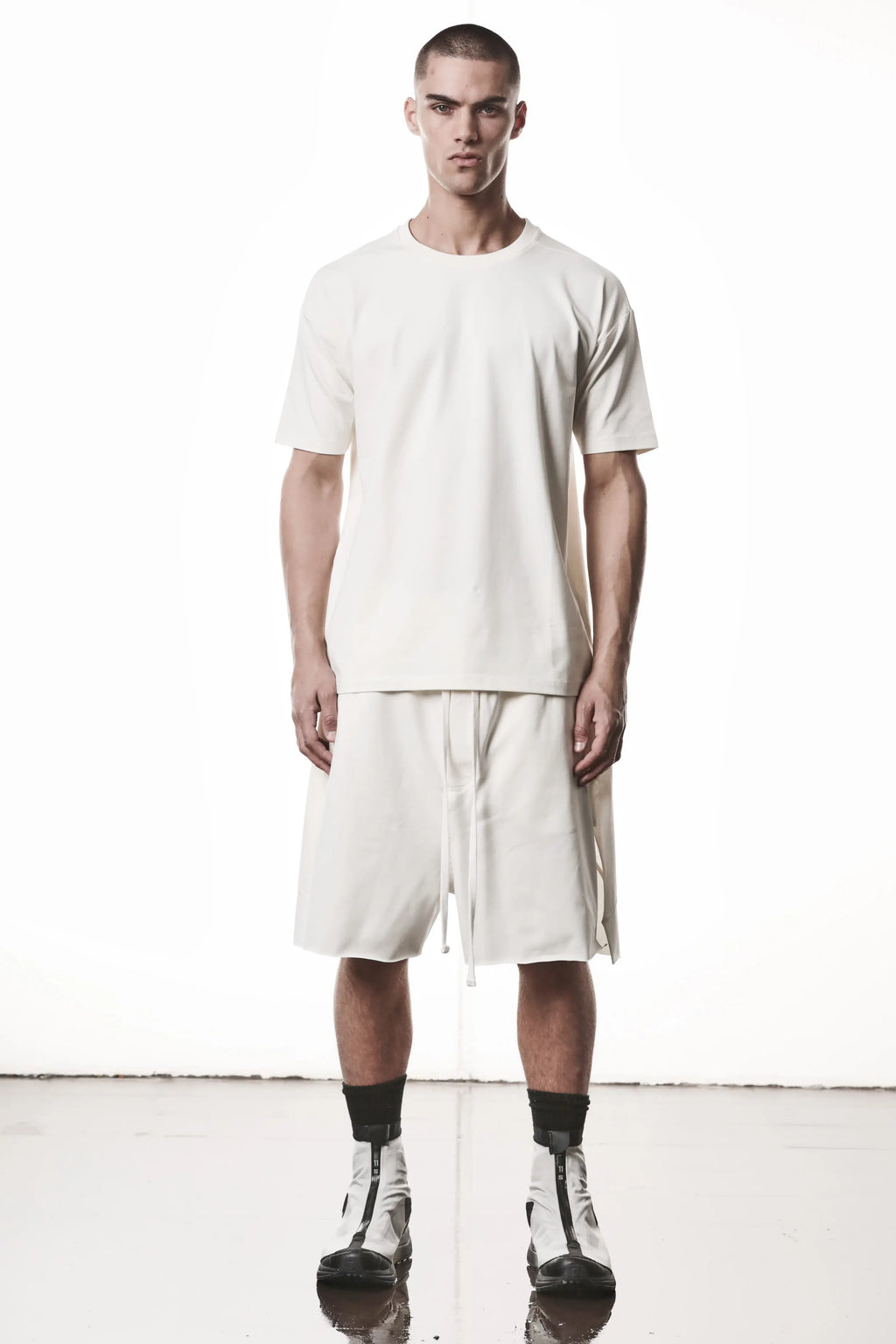 Thom Krom, Mens T-Shirt, White, Cotton Elastane/Spandex, Short Sleeves, 100% Cotton, Reflective Print, Back Print, Full Body Front View. 