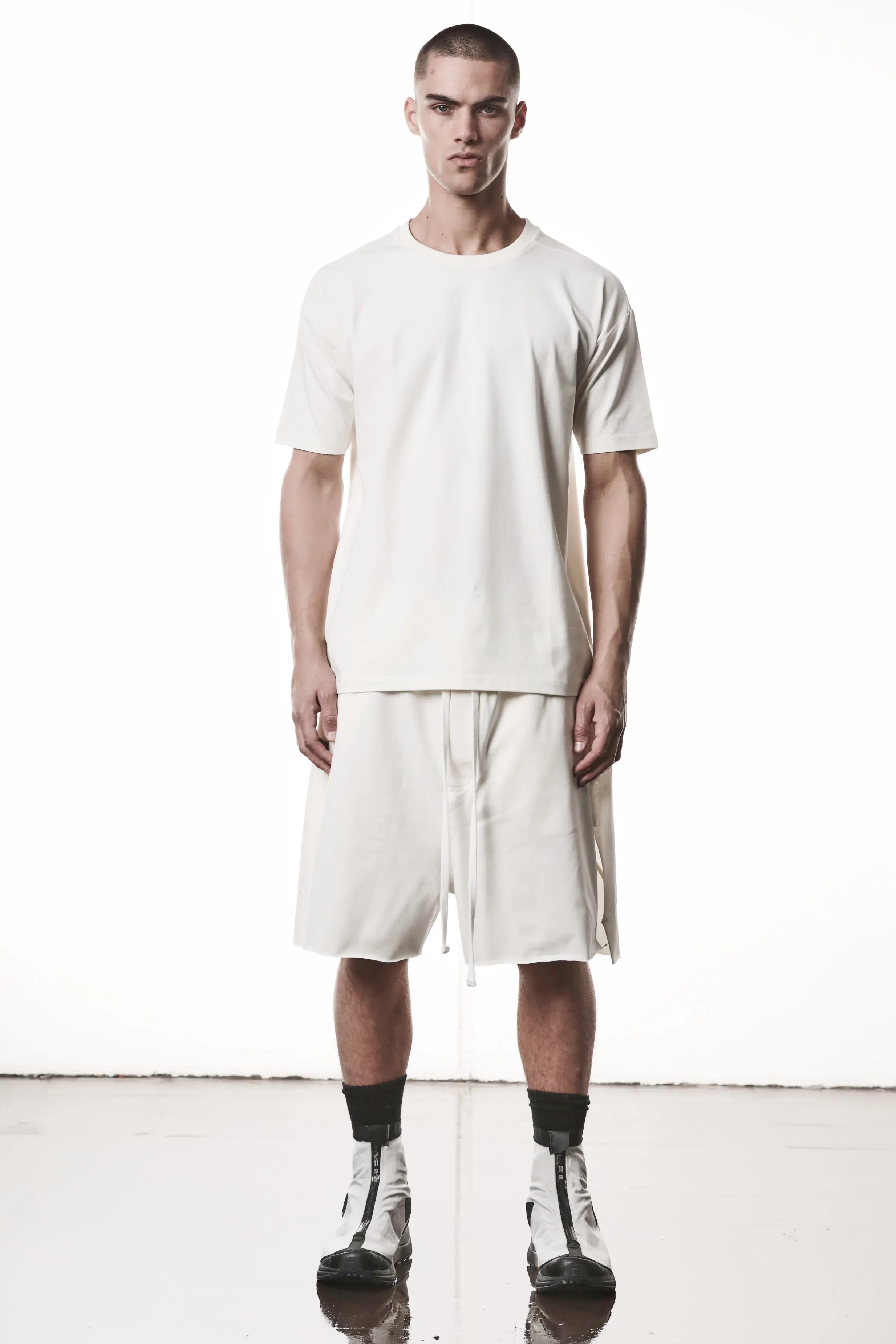 Thom Krom, Mens T-Shirt, White, Cotton Elastane/Spandex, Short Sleeves, 100% Cotton, Reflective Print, Back Print, Full Body Front View. 