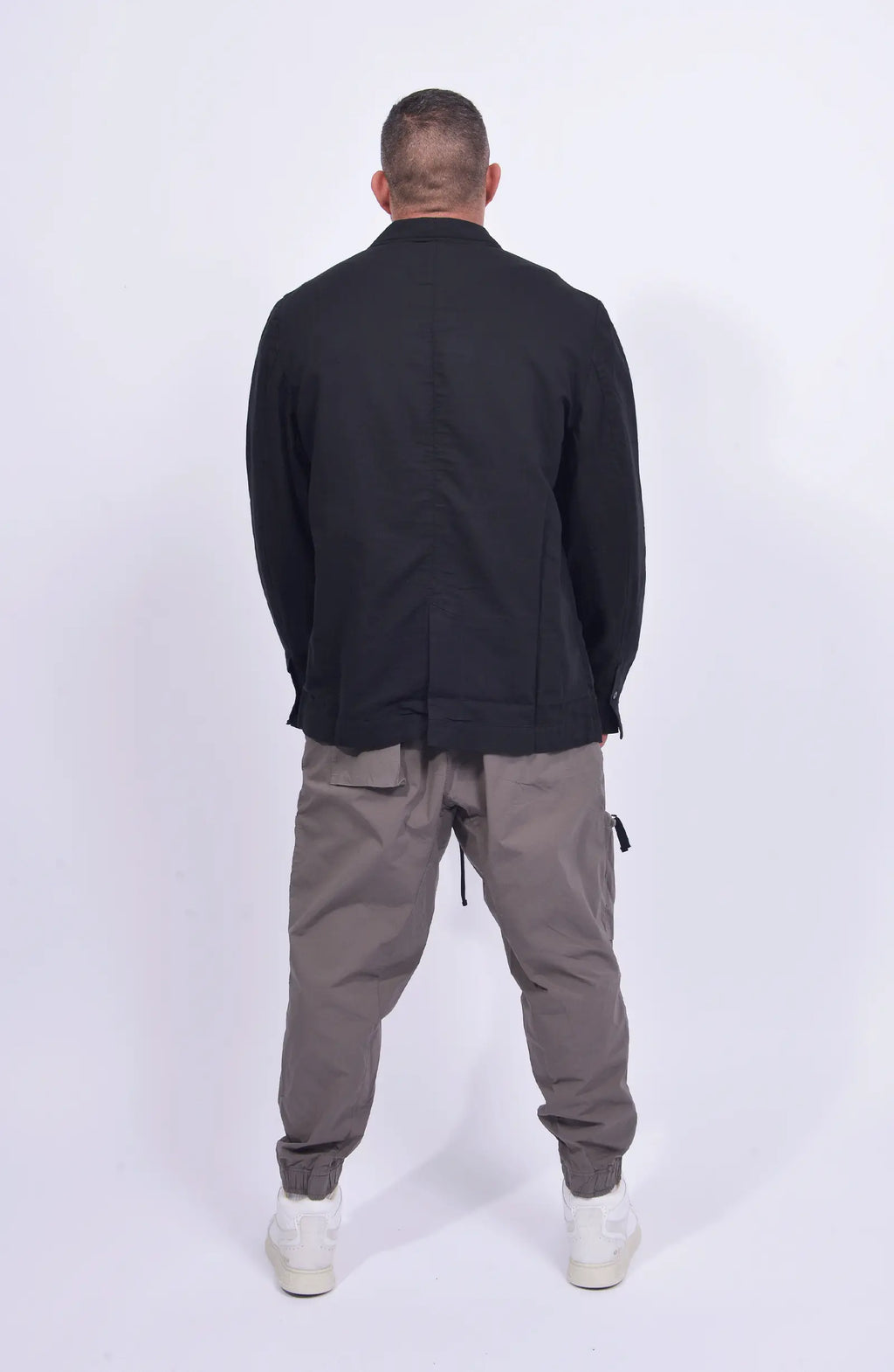 Thom Krom, Mens Blazer, Black, Buttons, V-Neck, Collar, Patch Pockets, Long Sleeves, White T-Shirt, Side Pockets, Slit in Back, Woven, Full Body Back View. 