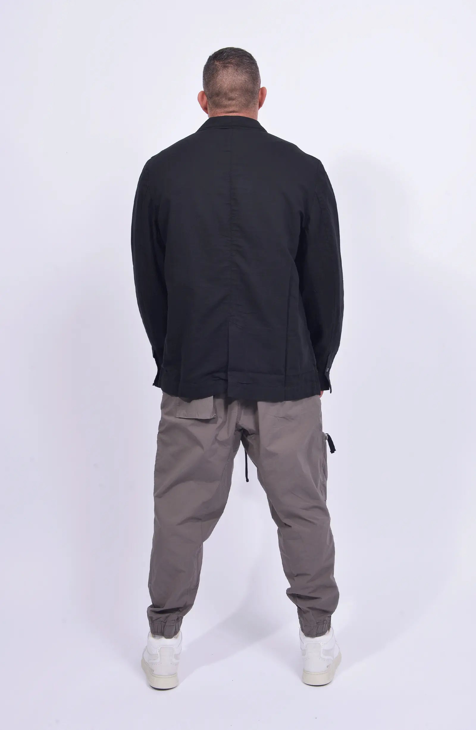 Thom Krom, Mens Blazer, Black, Buttons, V-Neck, Collar, Patch Pockets, Long Sleeves, White T-Shirt, Side Pockets, Slit in Back, Woven, Full Body Back View. 