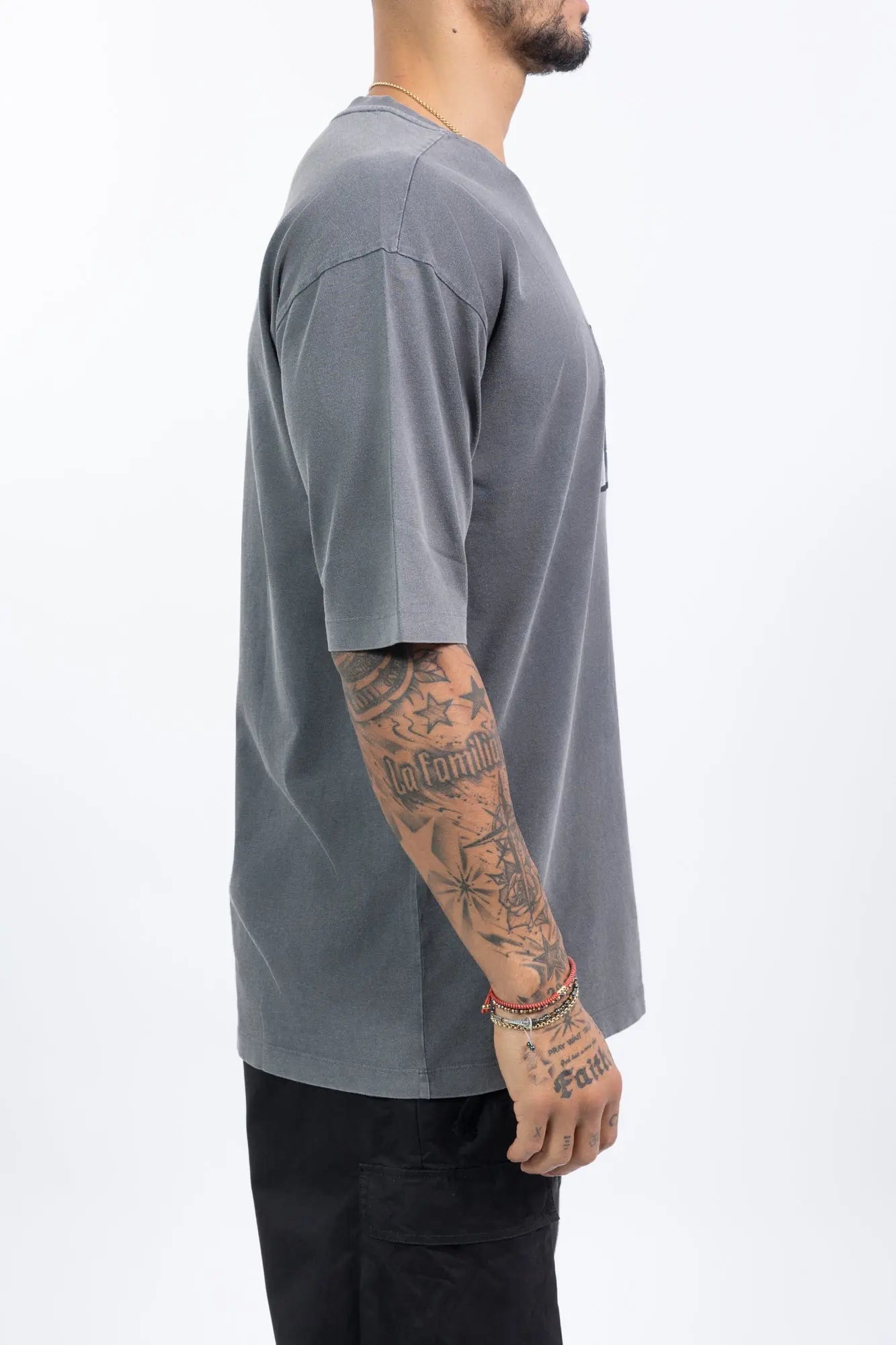 Thom Krom,Mens T-Shirt,Round Crewneck With Ribbed Fabric,Loose Fit,Front Printed Graphic Logo Patch,Dropped Shoulders,Double Stitched Hem And Cuffs, Side View.