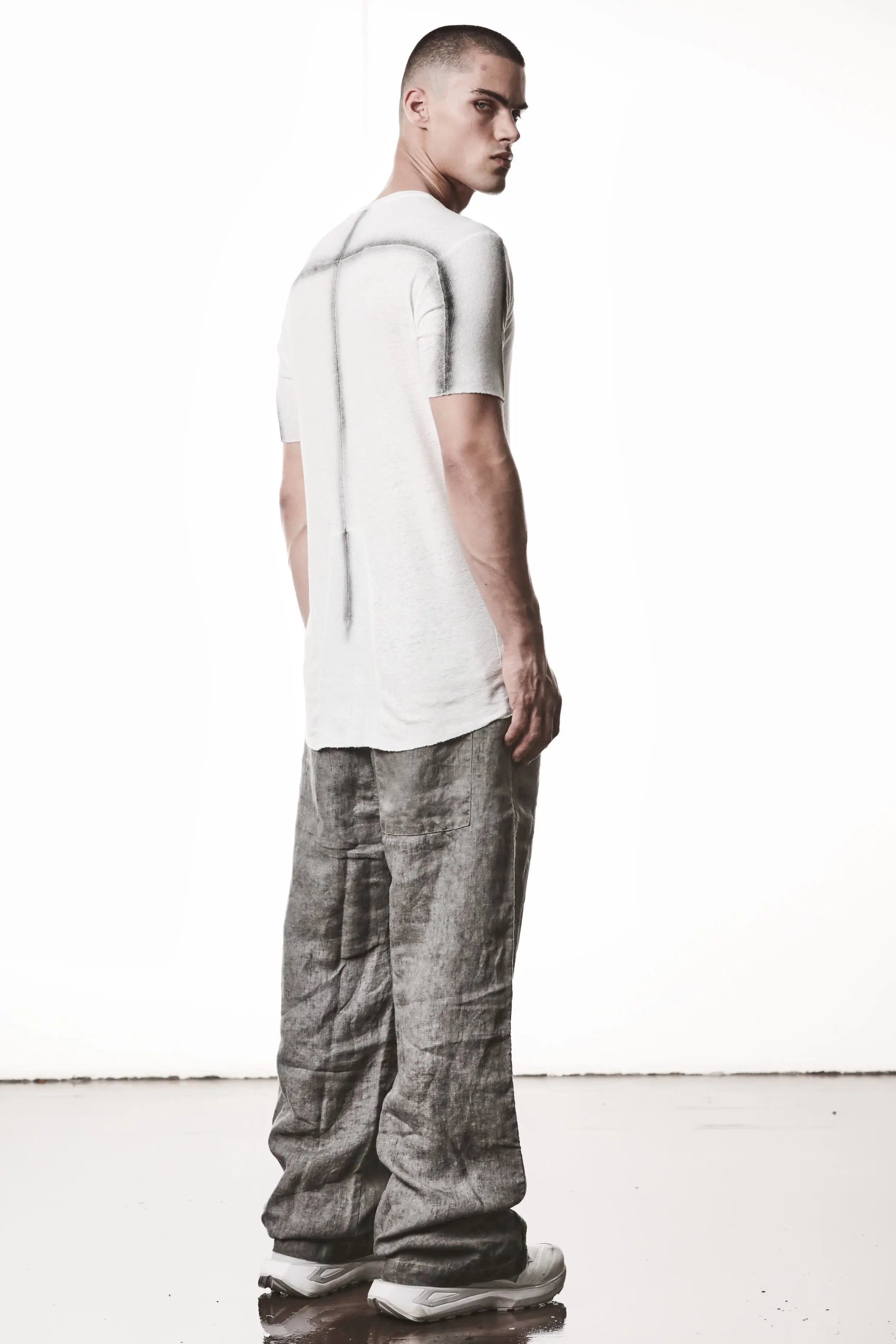Thom Krom T-Shirt , Mens T-Shirt , Off White Cotton , Raw Cut Hem , Raw Cut Sleeves , Round Crewneck , Slim Fit , Standard Length, Signature Front Level  Shoulders Seams , Vertical Curved Dark Stiching Lines , Backside Dark Stiching Lines , Linen , Viscose , Cotton , Backside Whole Body Photo