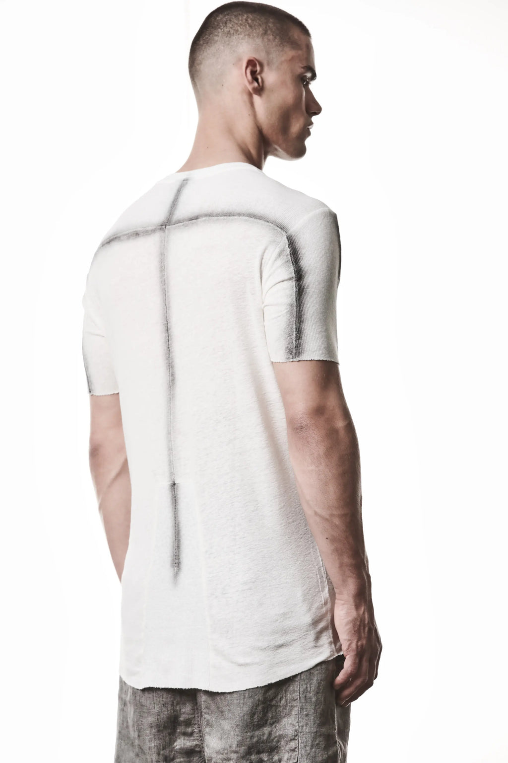Thom Krom T-Shirt , Mens T-Shirt , Off White Cotton , Raw Cut Hem , Raw Cut Sleeves , Round Crewneck , Slim Fit , Standard Length, Signature Front Level  Shoulders Seams , Vertical Curved Dark Stiching Lines , Backside Dark Stiching Lines ,   Half Body Photo , Linen , Viscose , Cotton , Backside Upper Body Photo