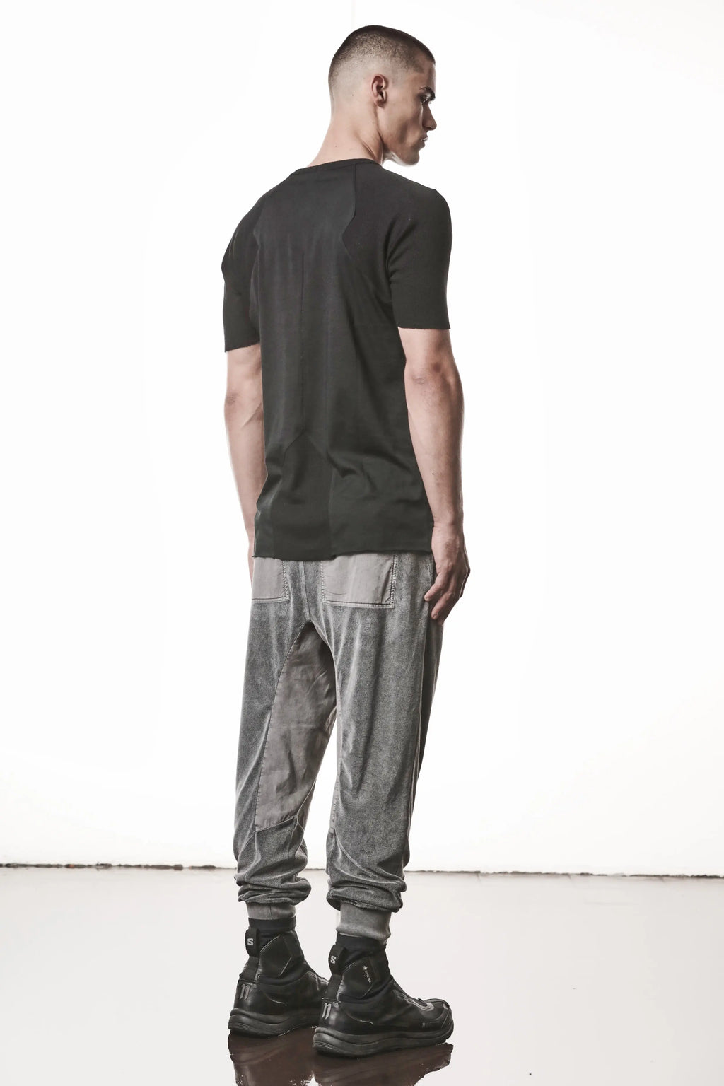 Thom Krom T-Shirt , Mens T-Shirt , Black Cotton , Raw Cut Hem , Raw Cut  Sleeves ,  Linen Rib Jersey , Round Crewneck , Slim Fit , Standard Length ,  Side Angle Whole Body Photo